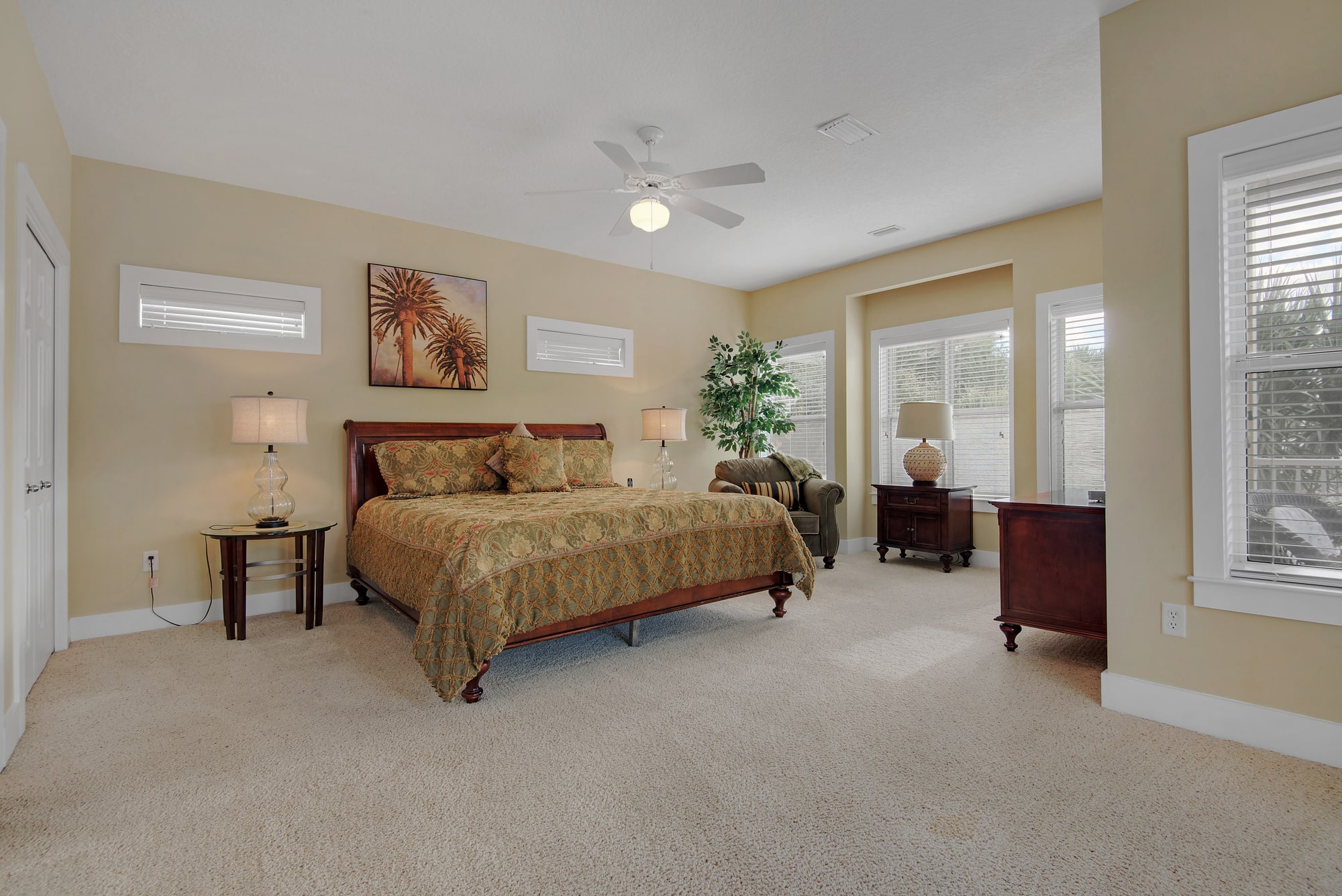Master suite w/ king bed and a partial view of the Gulf