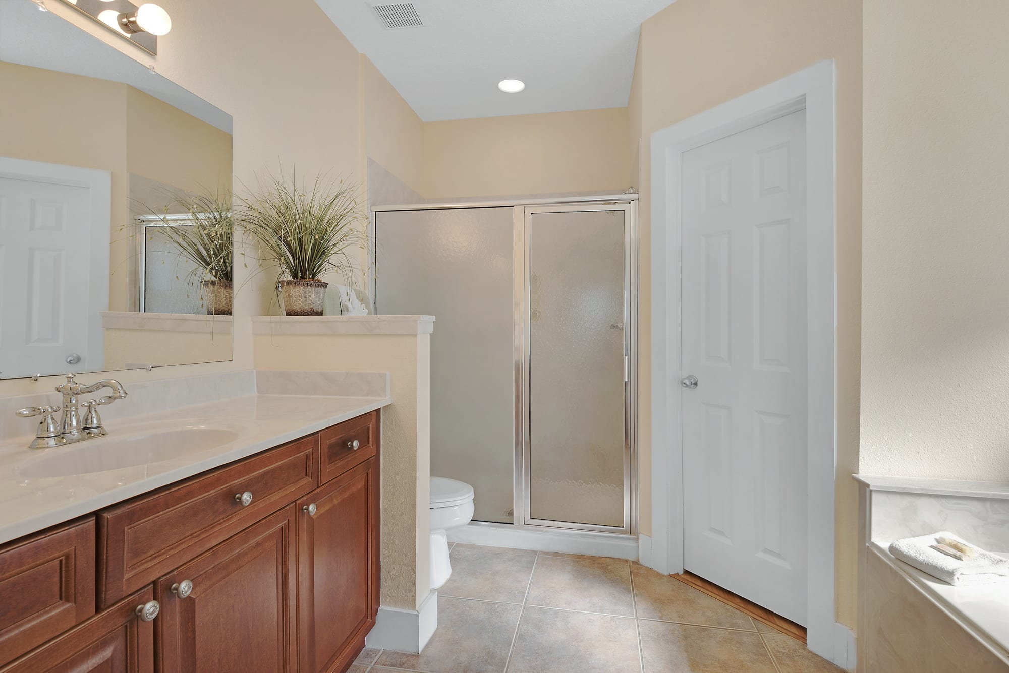 master bath has dual sinks and separate shower
