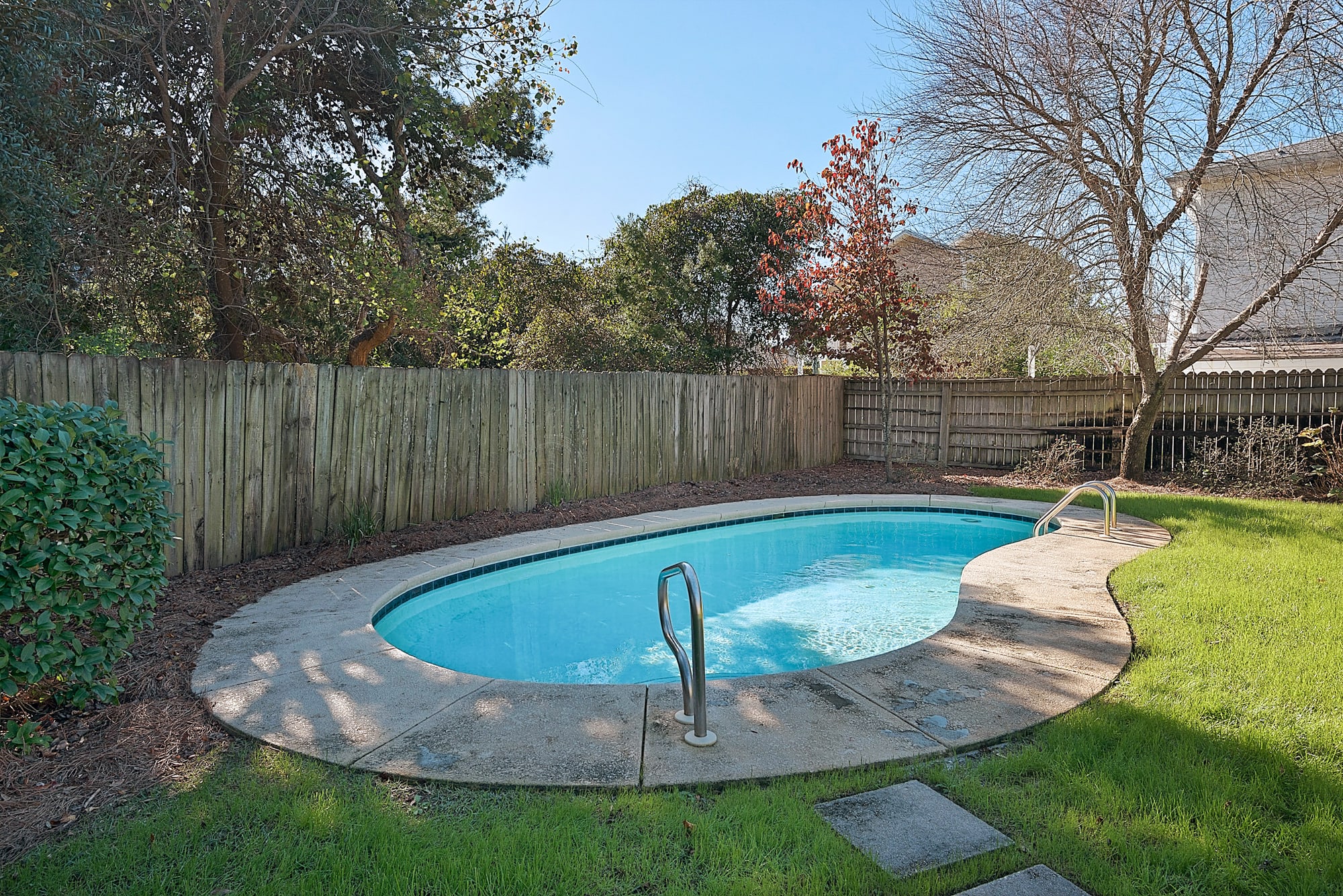 large back yard with in ground pool!