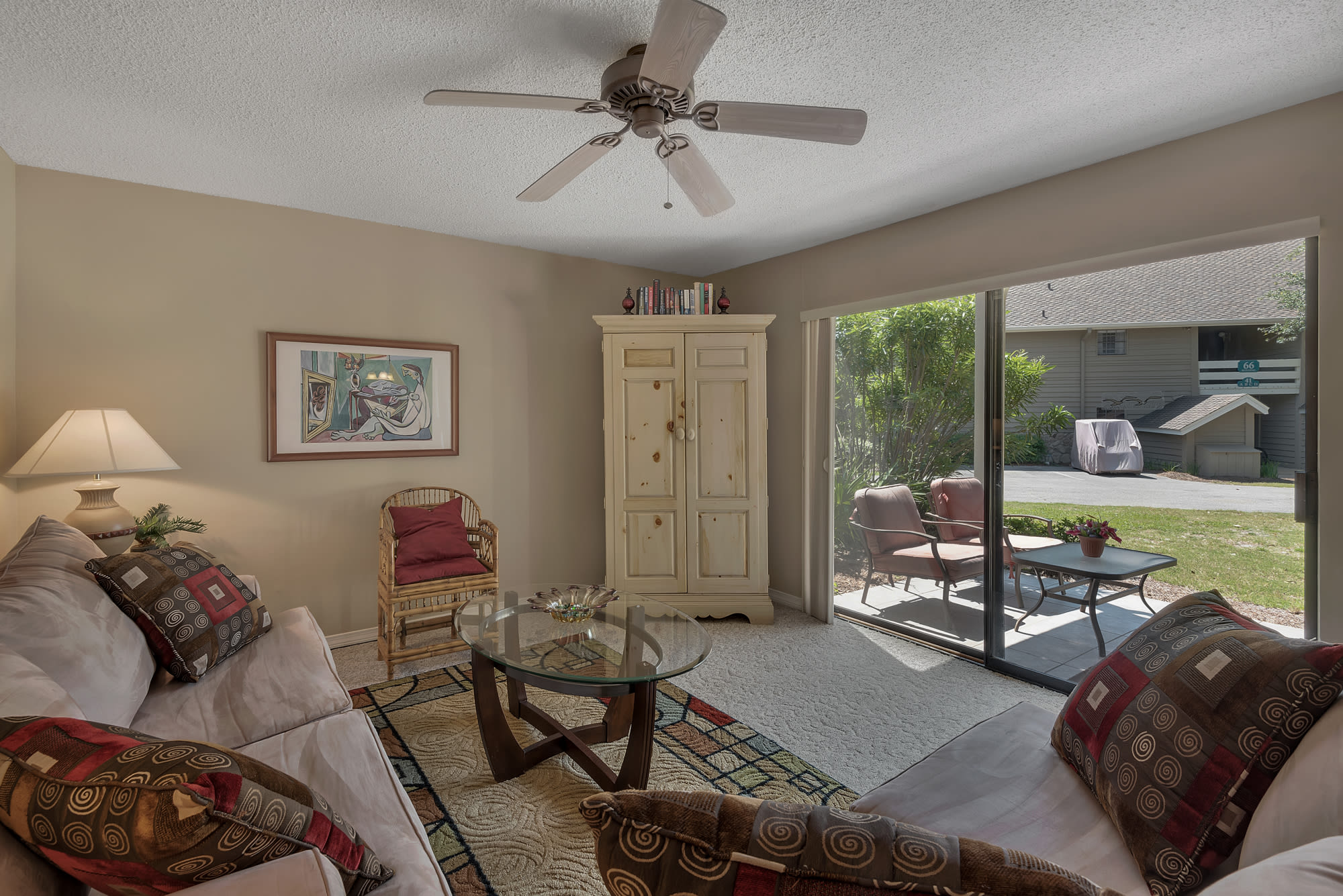 first floor condo has access to patio off living room