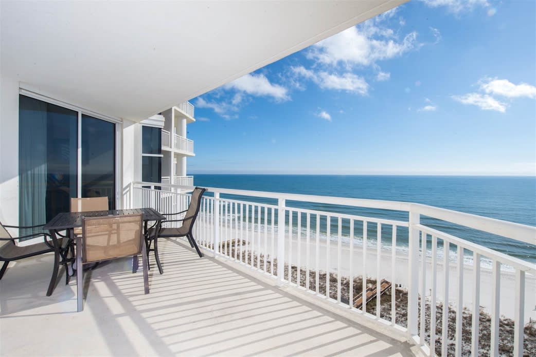 Paradise!!  Balcony seating for 4. Also includes reclining lounger (not shown). Access balcony from living area or master suite.