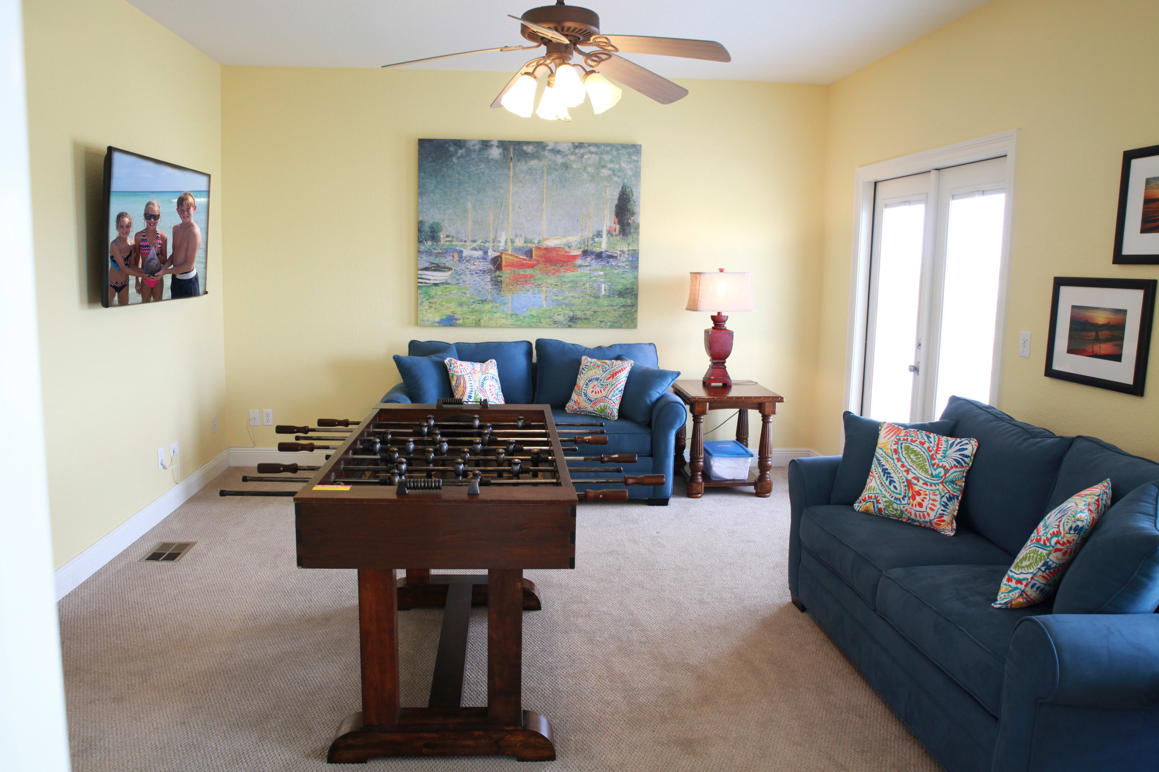 Game room on 3rd level with two full-size sleeper sofas