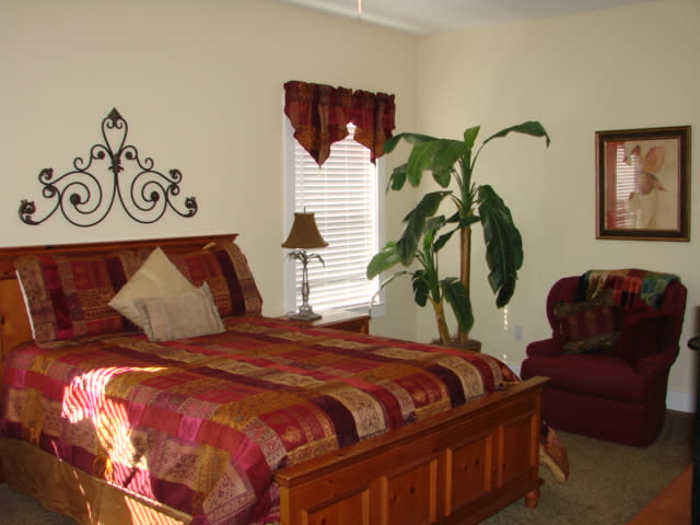 Second floor guest bedroom with queen bed