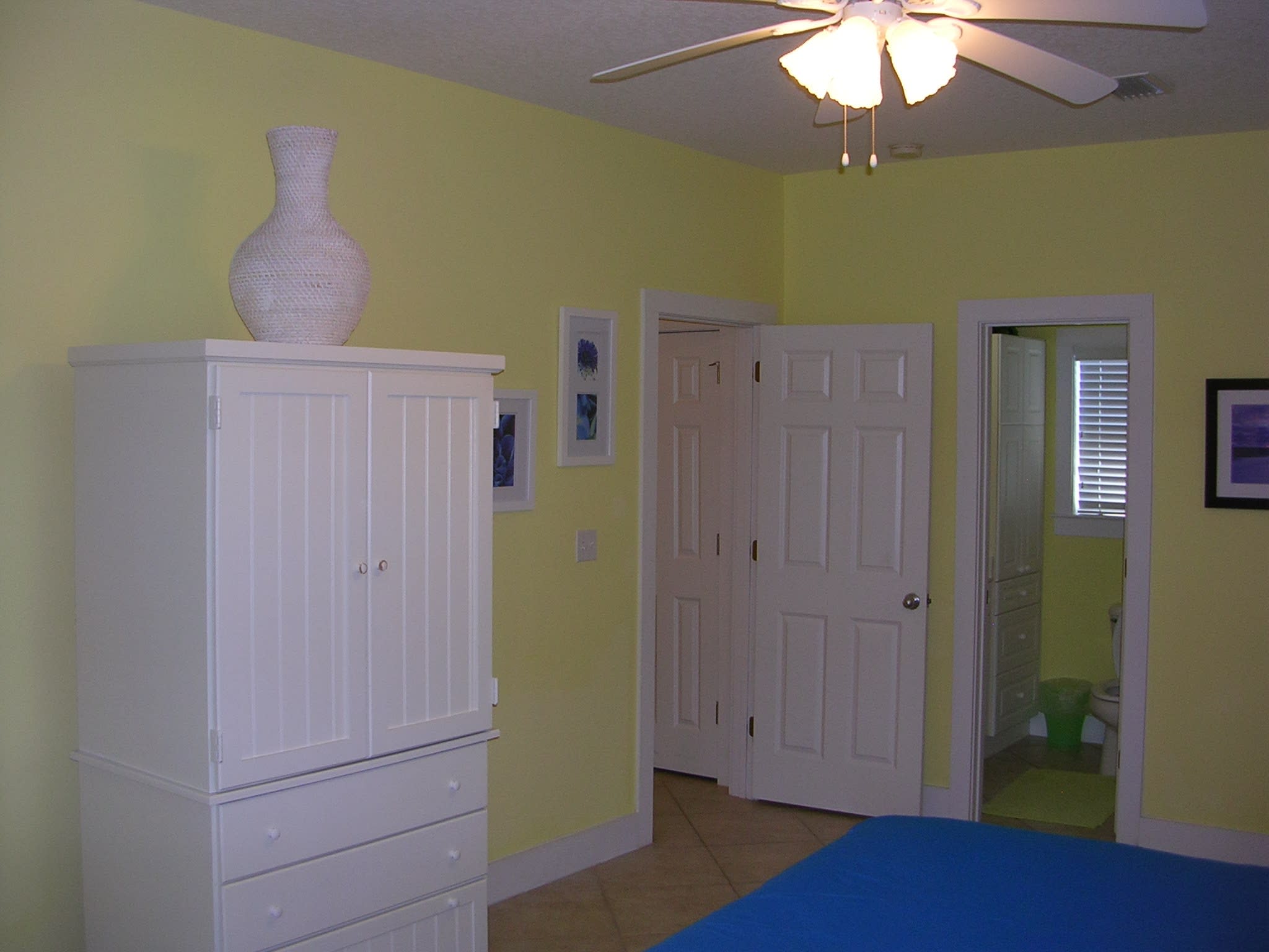 Large tv in armoire in upstairs guest bedroom
