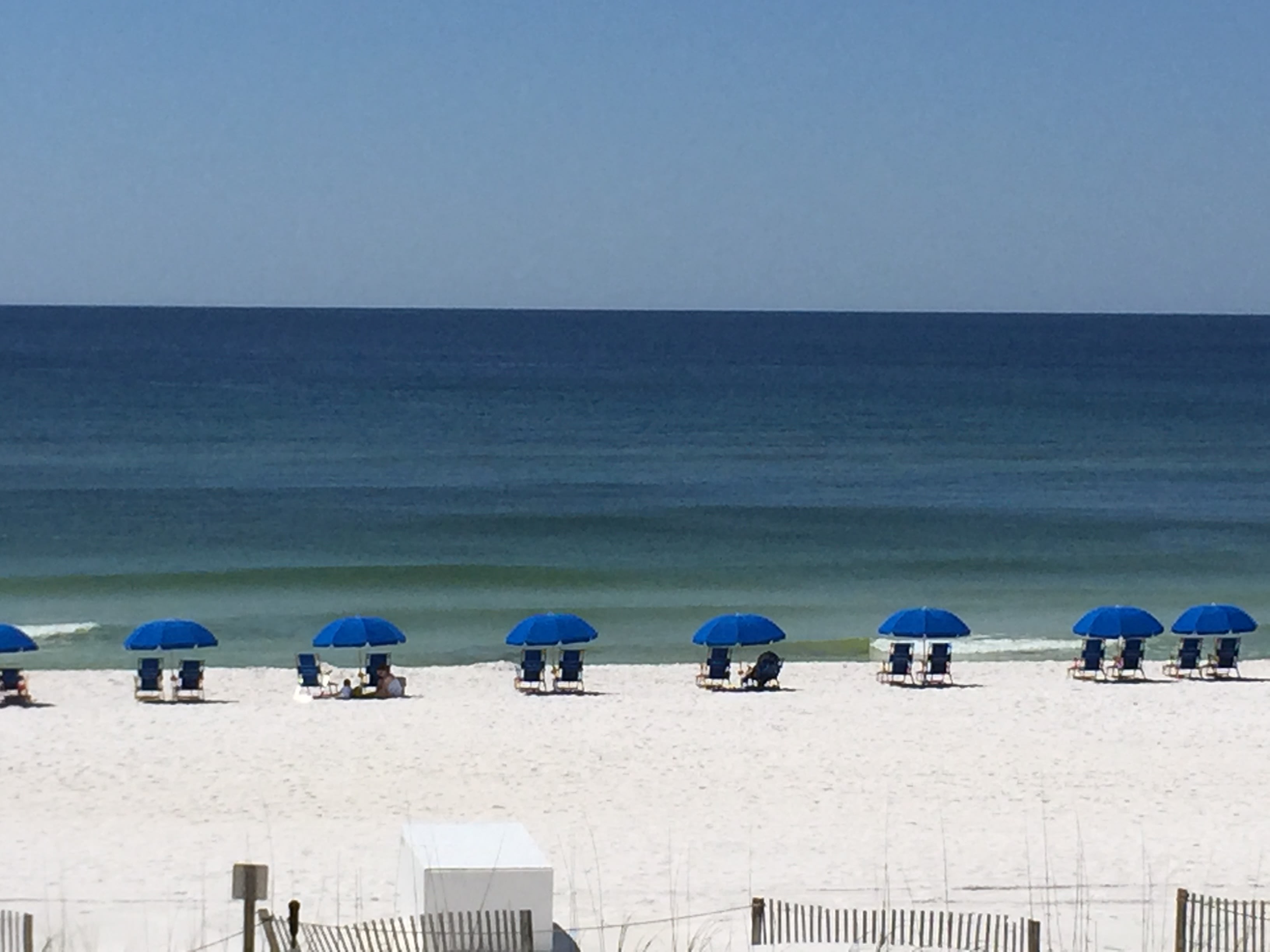 View from the Patio showing complimentary Beach Chairs/Umbrella Service for Guests