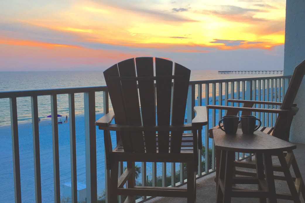 This chair is waiting for you!  Great place to watch the sunset or the activity on the beach