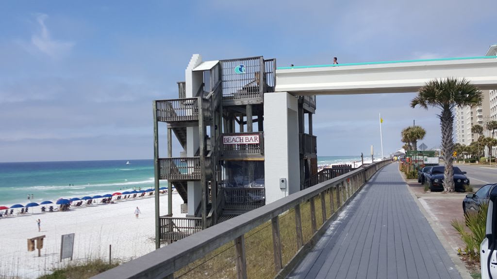 Walking path under the Sky Bridge. Listen to the surf, watch the Pelican and Sea Gulls fly along the Shorline and the Dolphins too!!