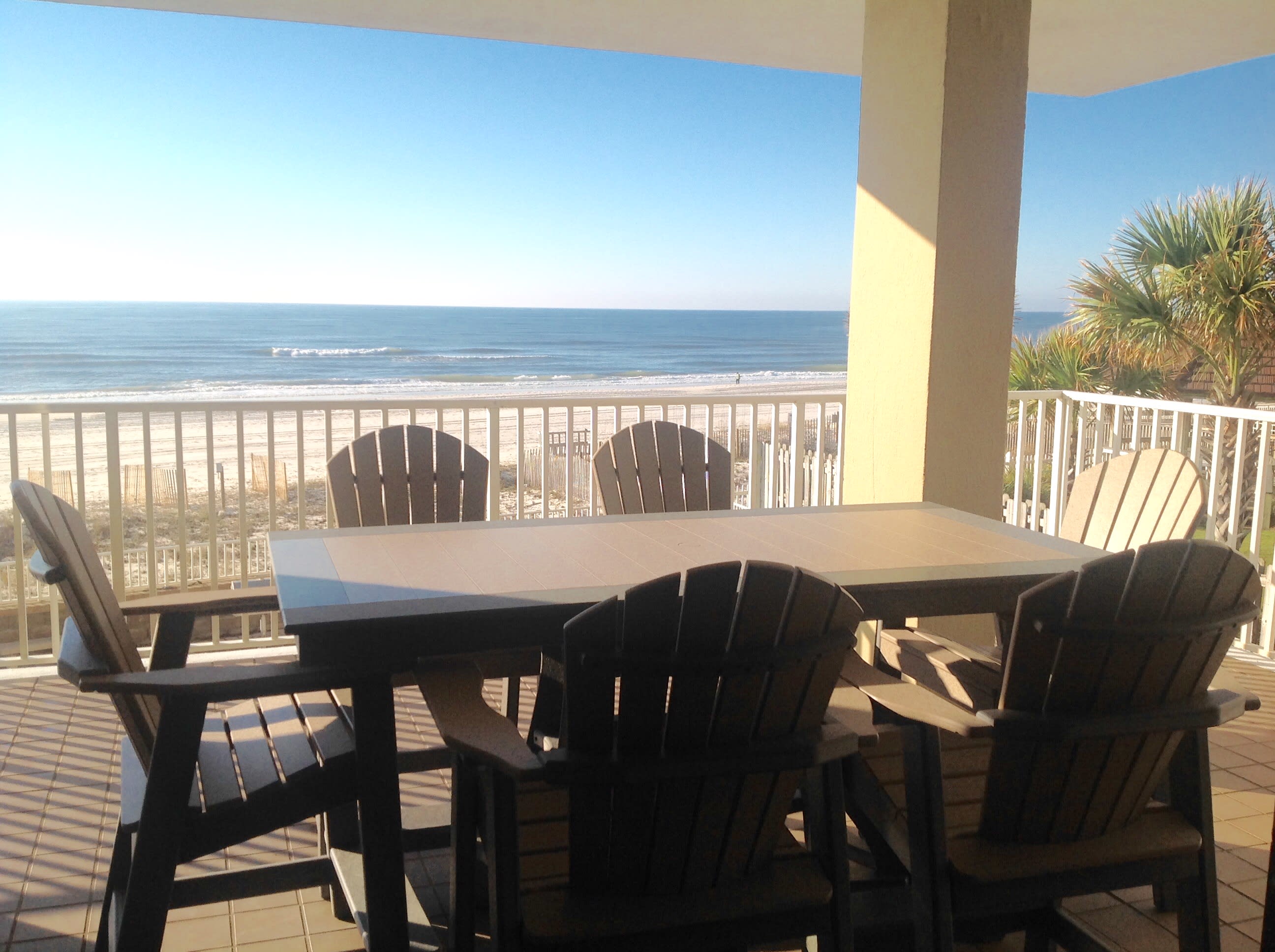 Beautiful new balcony furniture with seating for six.  Also two Adirondack chairs
