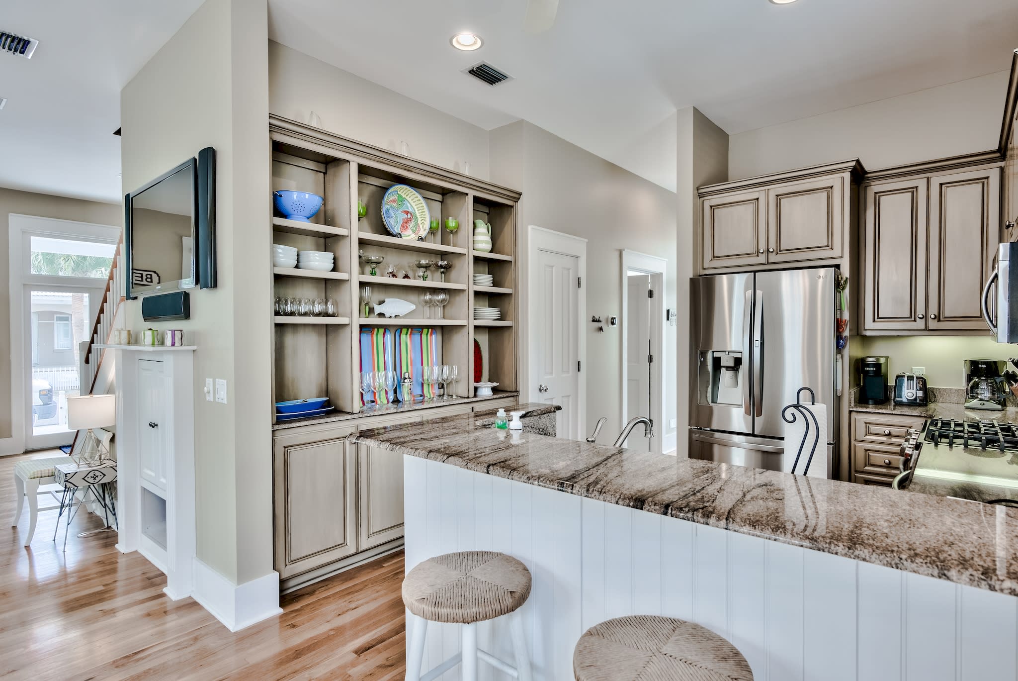 Kitchen with newer LG appliances and gorgeous custom cabinetry