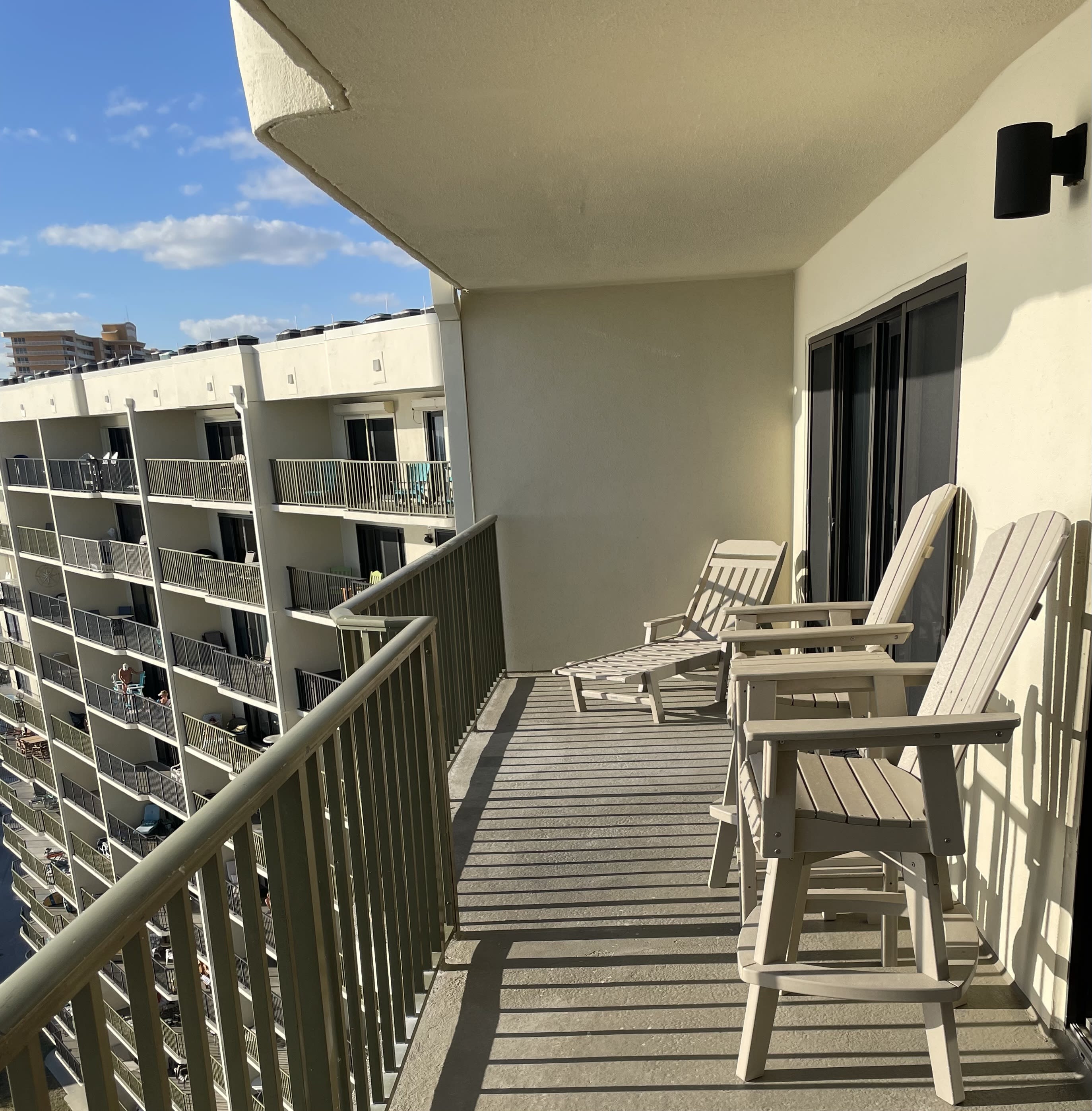 Lounge on the chaise or enjoy the view from the bar height Polywood chairs. 