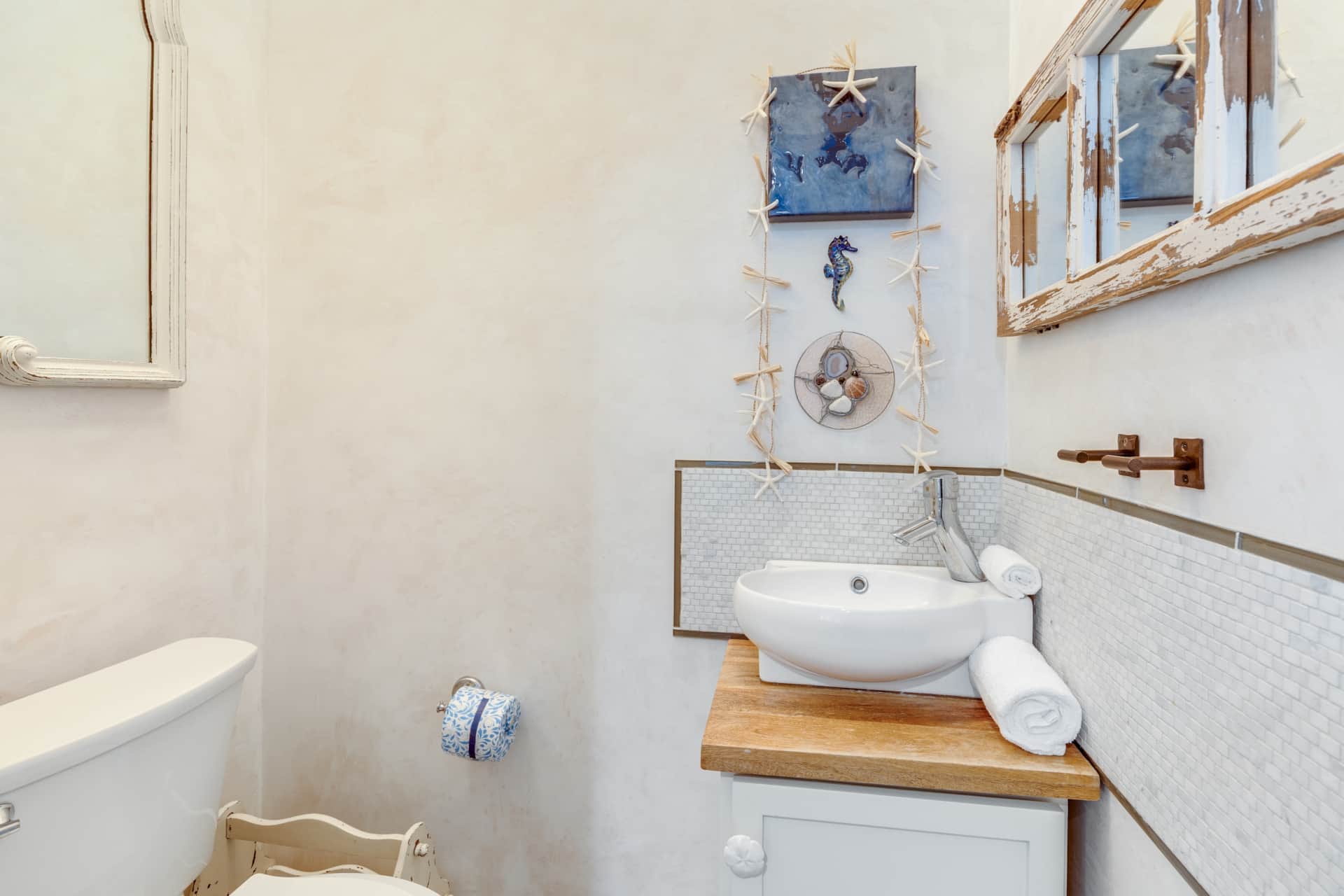 Powder room just off the dining space