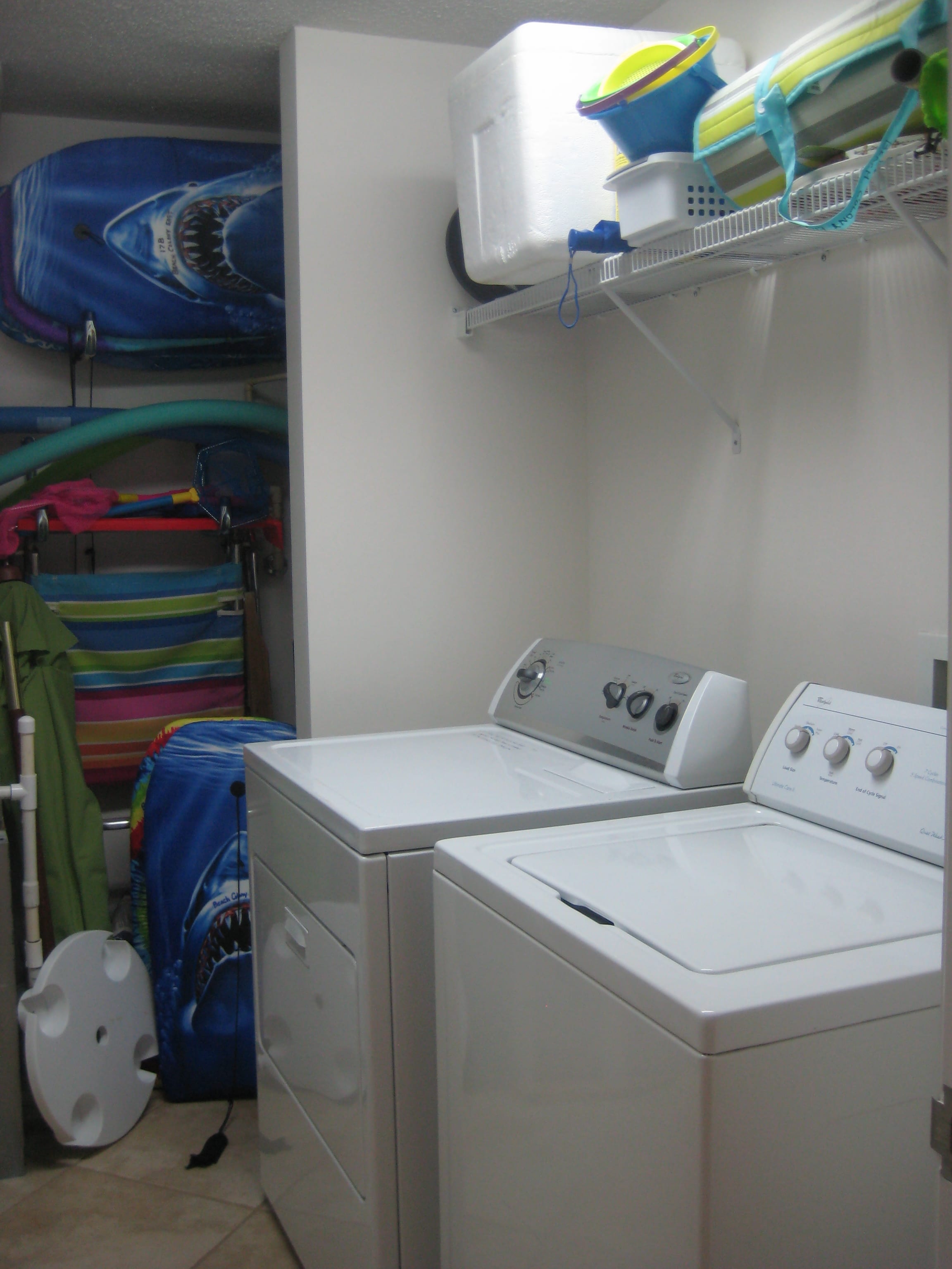 Washer, Dryer, chairs, cooler, umbrellas, etc. in condo for guest use