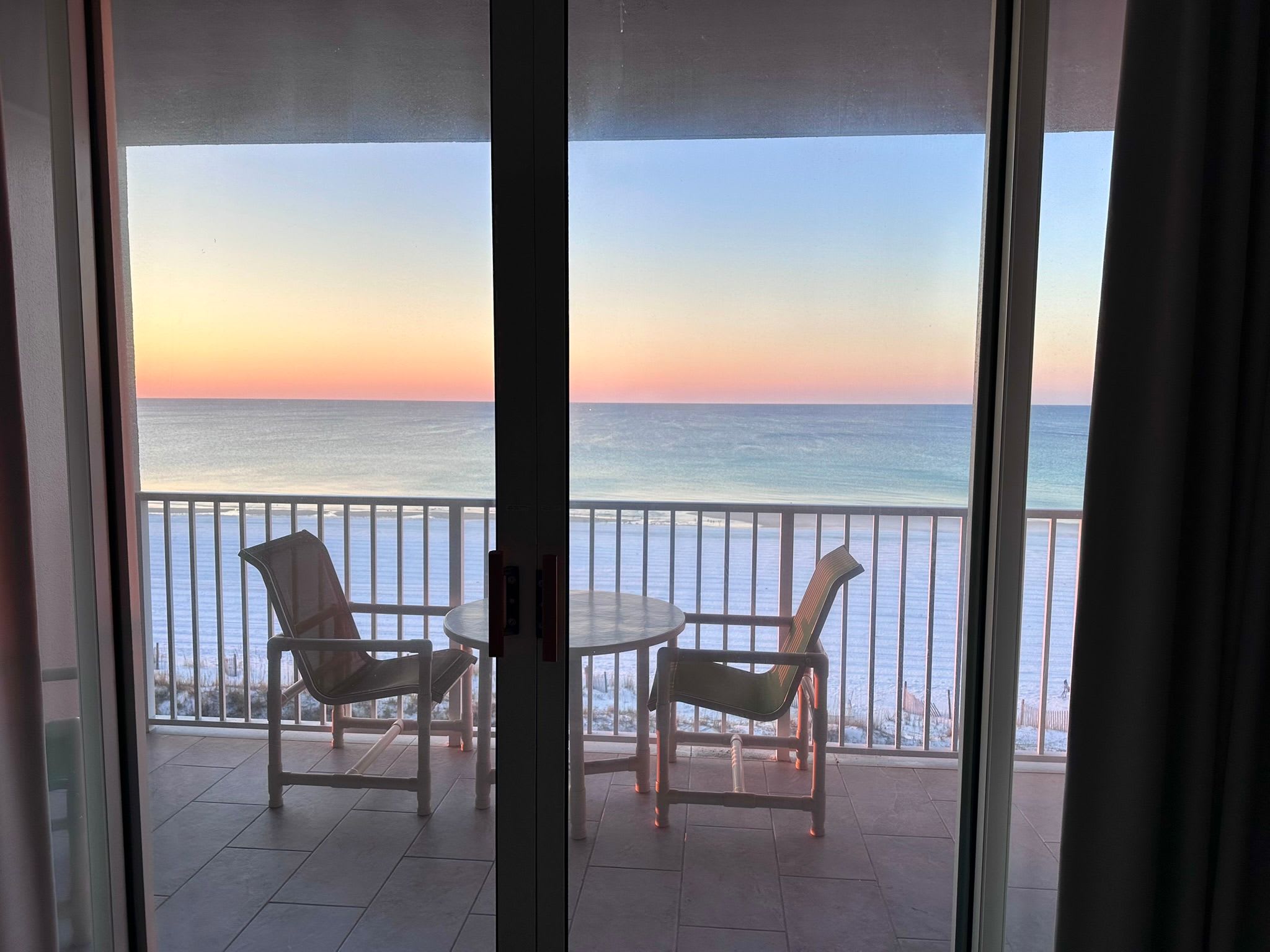 Enjoy the  balcony overlooking the Gulf.  Enjoy breakfast and coffee out here.