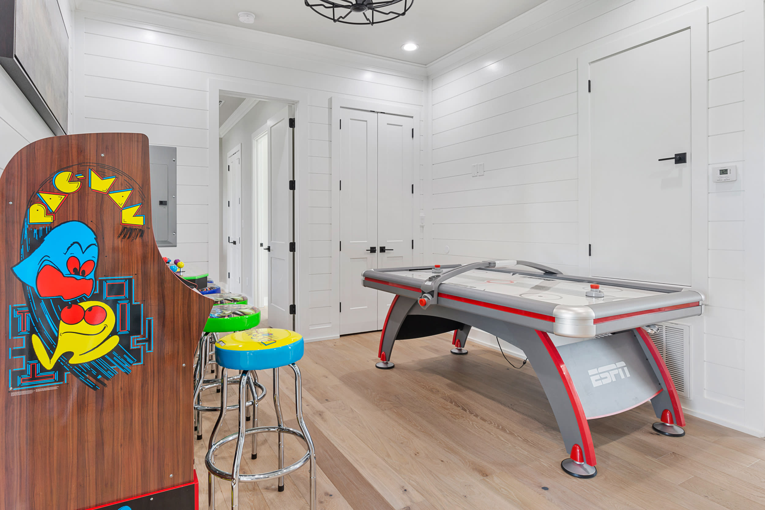 arcade area has full sized air hockey table