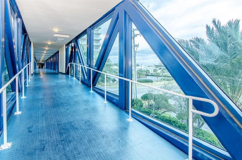 Air Conditioned Sky walk from the building to the beach