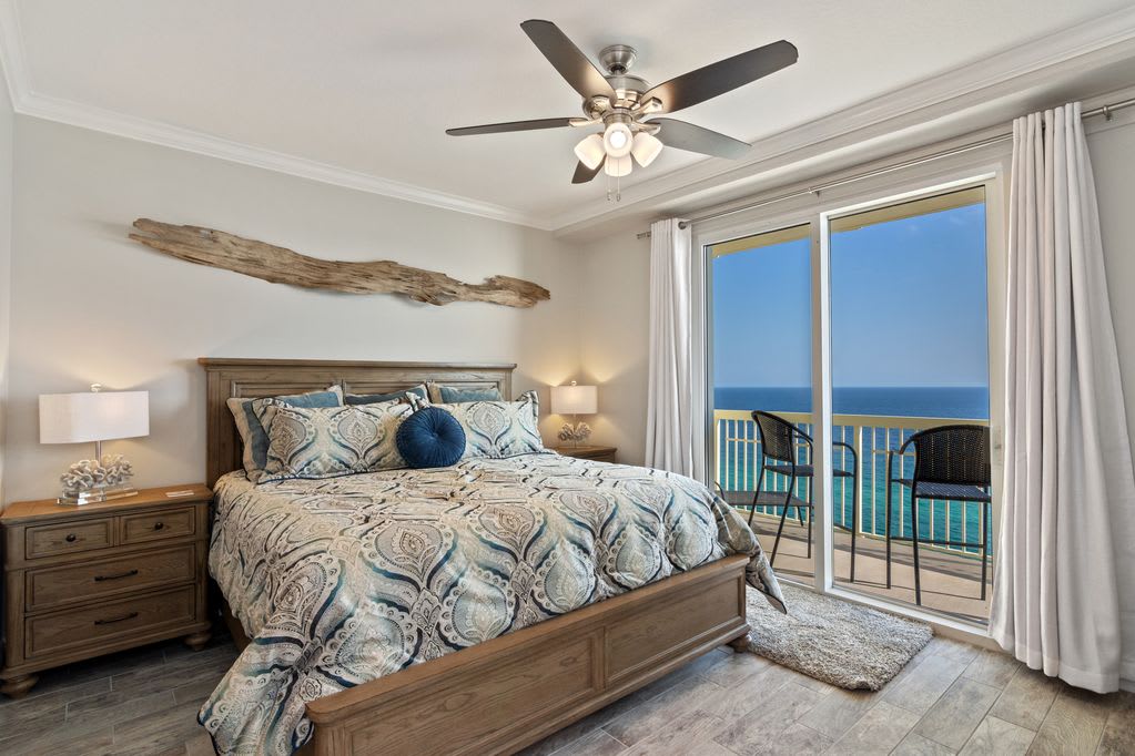 Master bedroom with private entrance to balcony.  