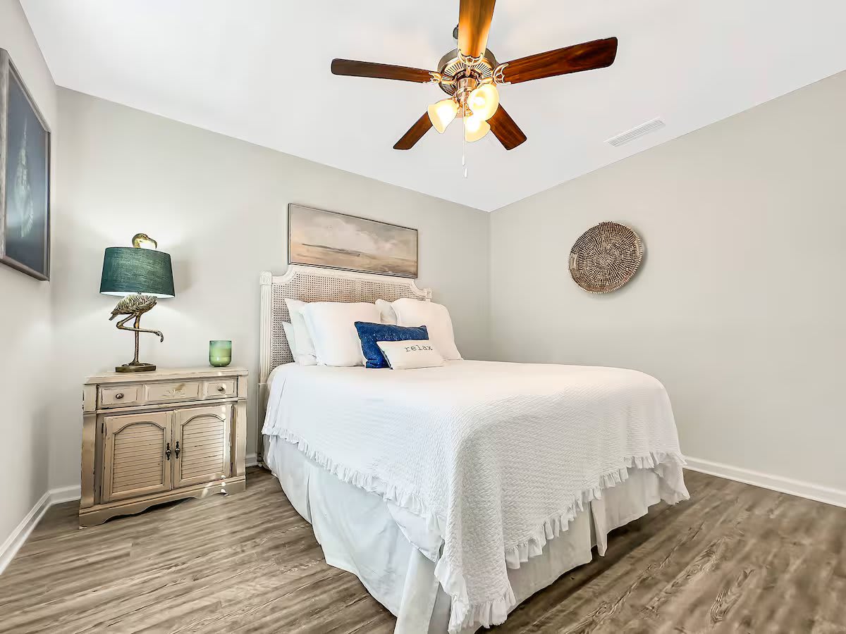 bedroom with queen bed and smart tv