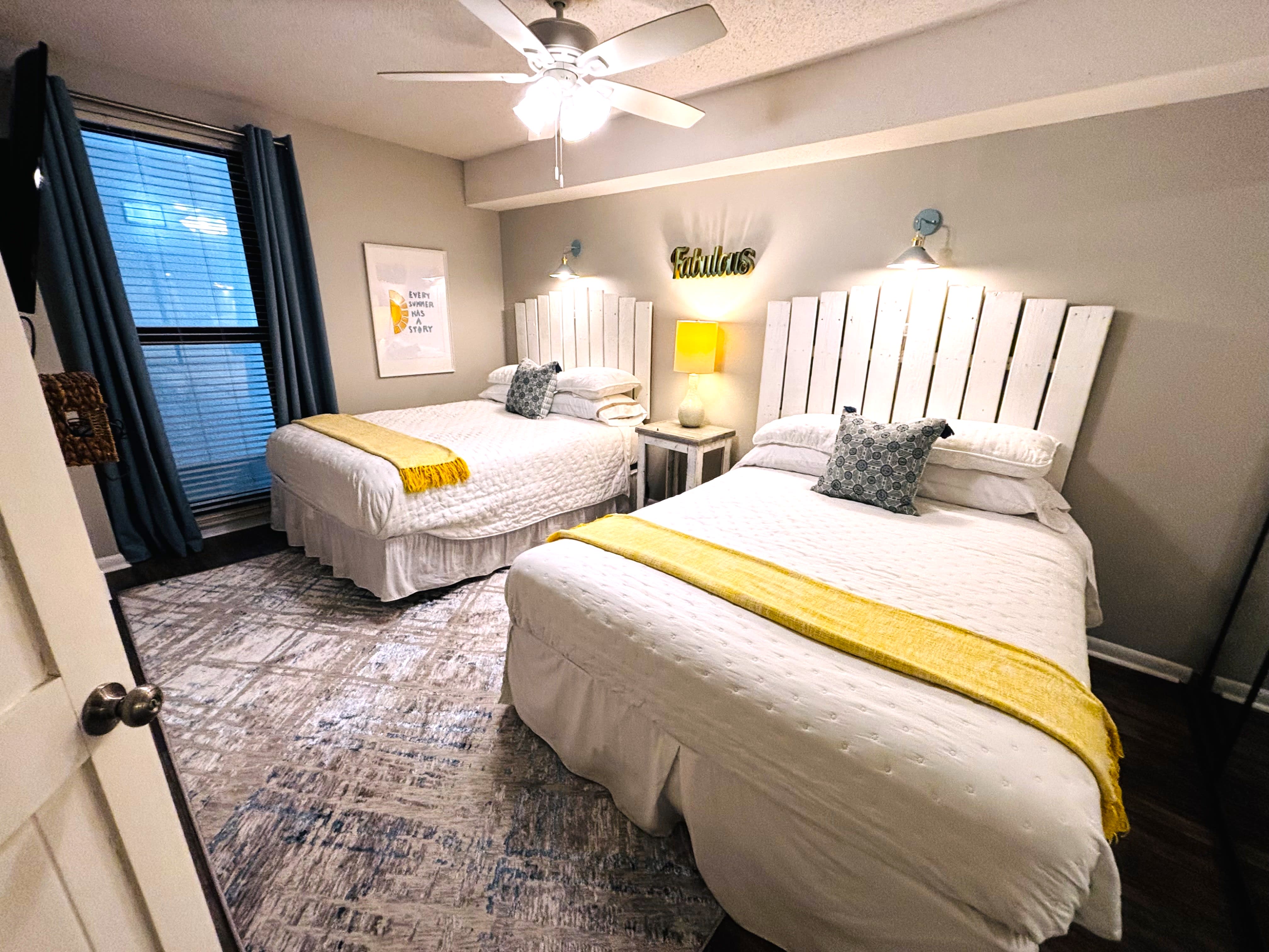 Guest bedroom has TWO queens &amp; storage in the closet.