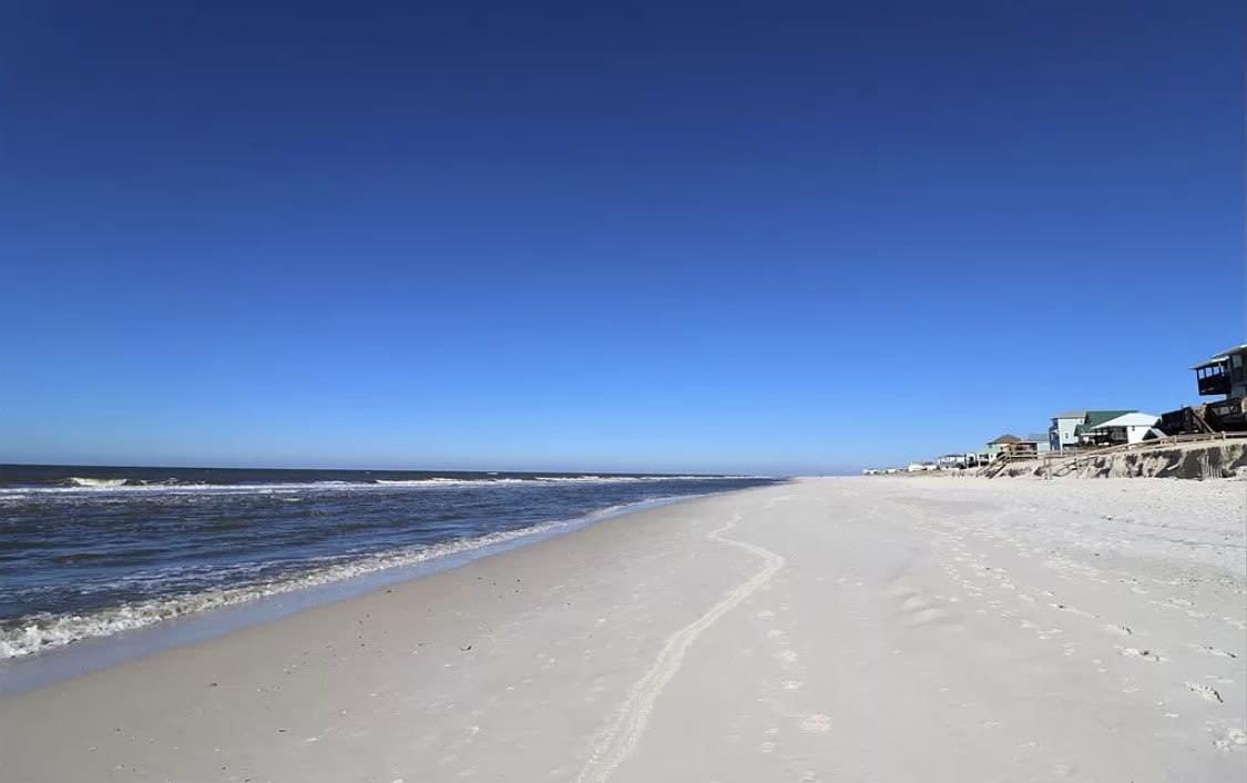 beautiful, uncrowded,  white sand beach awaits!
