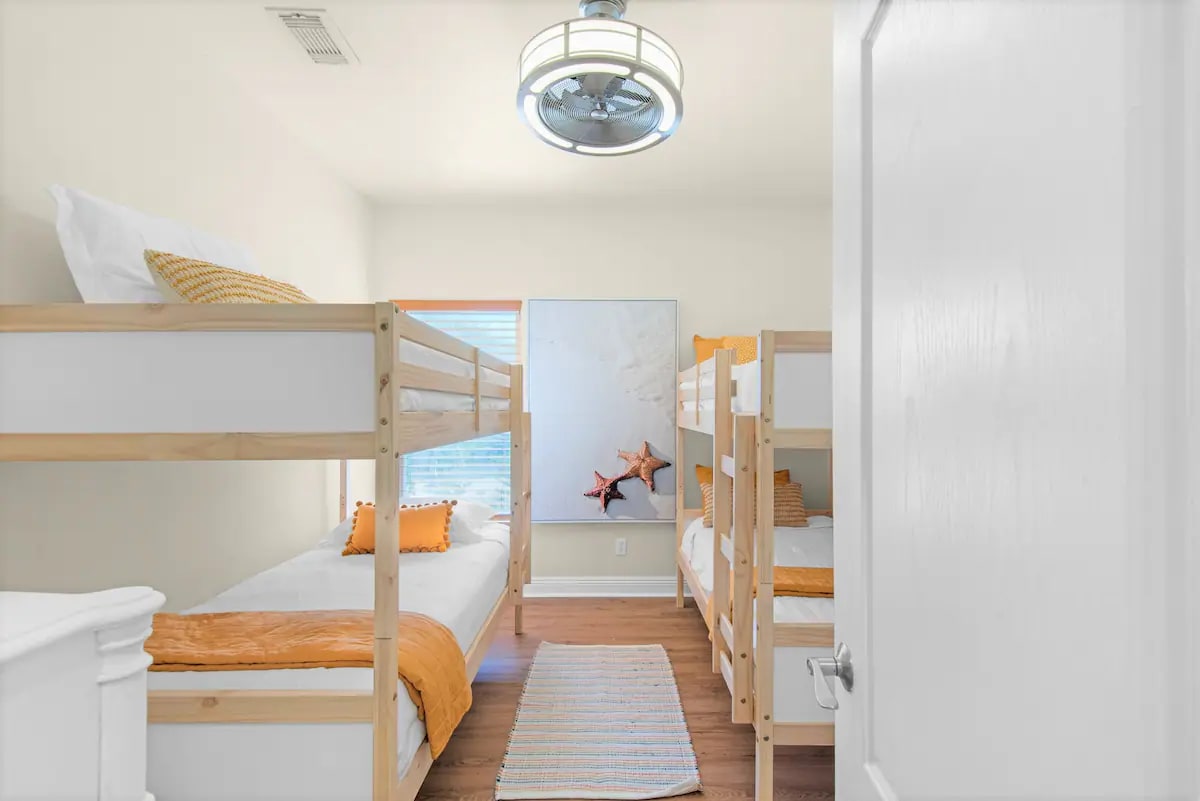 Shipwatch-21...1st floor. Bedroom 3. Photo 1. Two twin over twin bunks with wall mount TV. Sleeps 4.