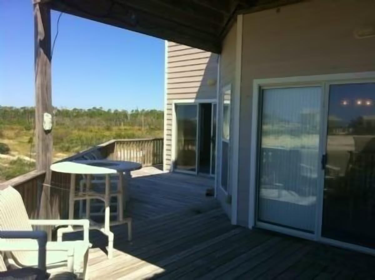 Large covered, private deck below to relax, listen to the waves or take a nap.