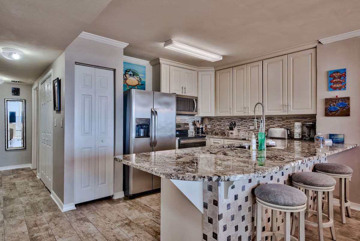 Three swivel bar stools