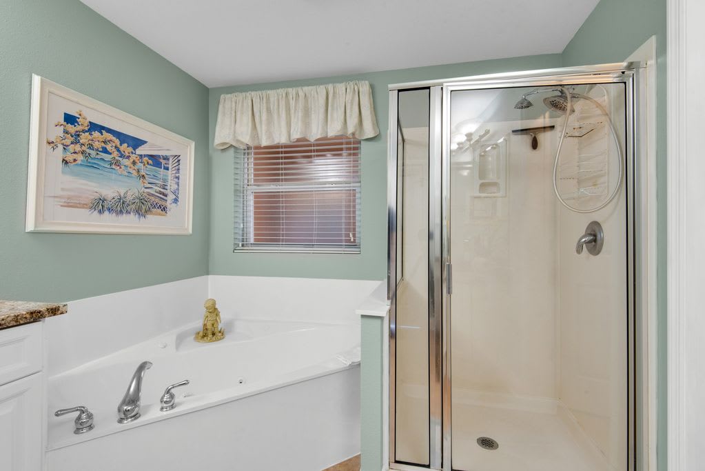 Master Bath has separate shower and jetted tub!   