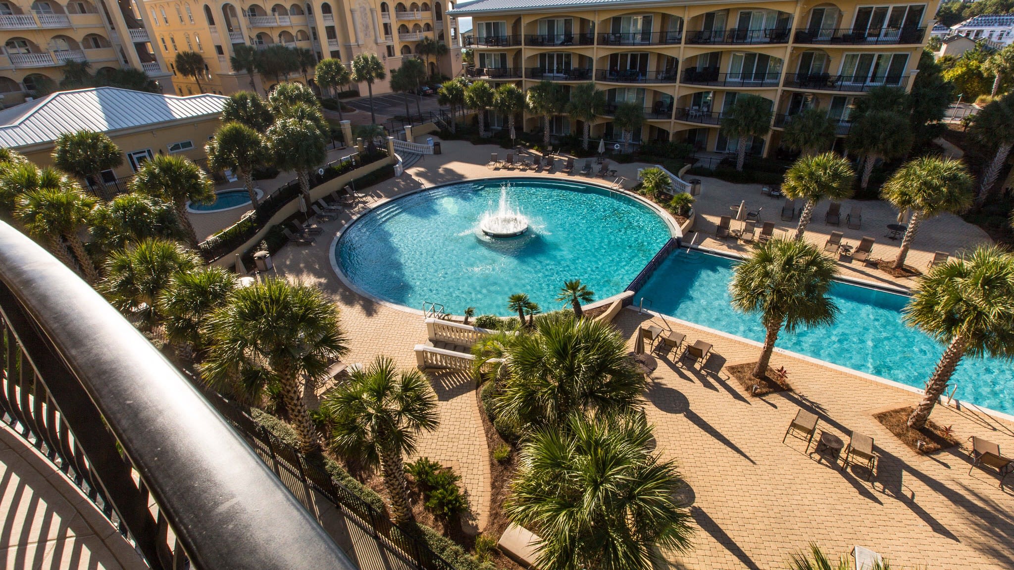 View of beautiful very large 8000 sq foot pool from our balcony