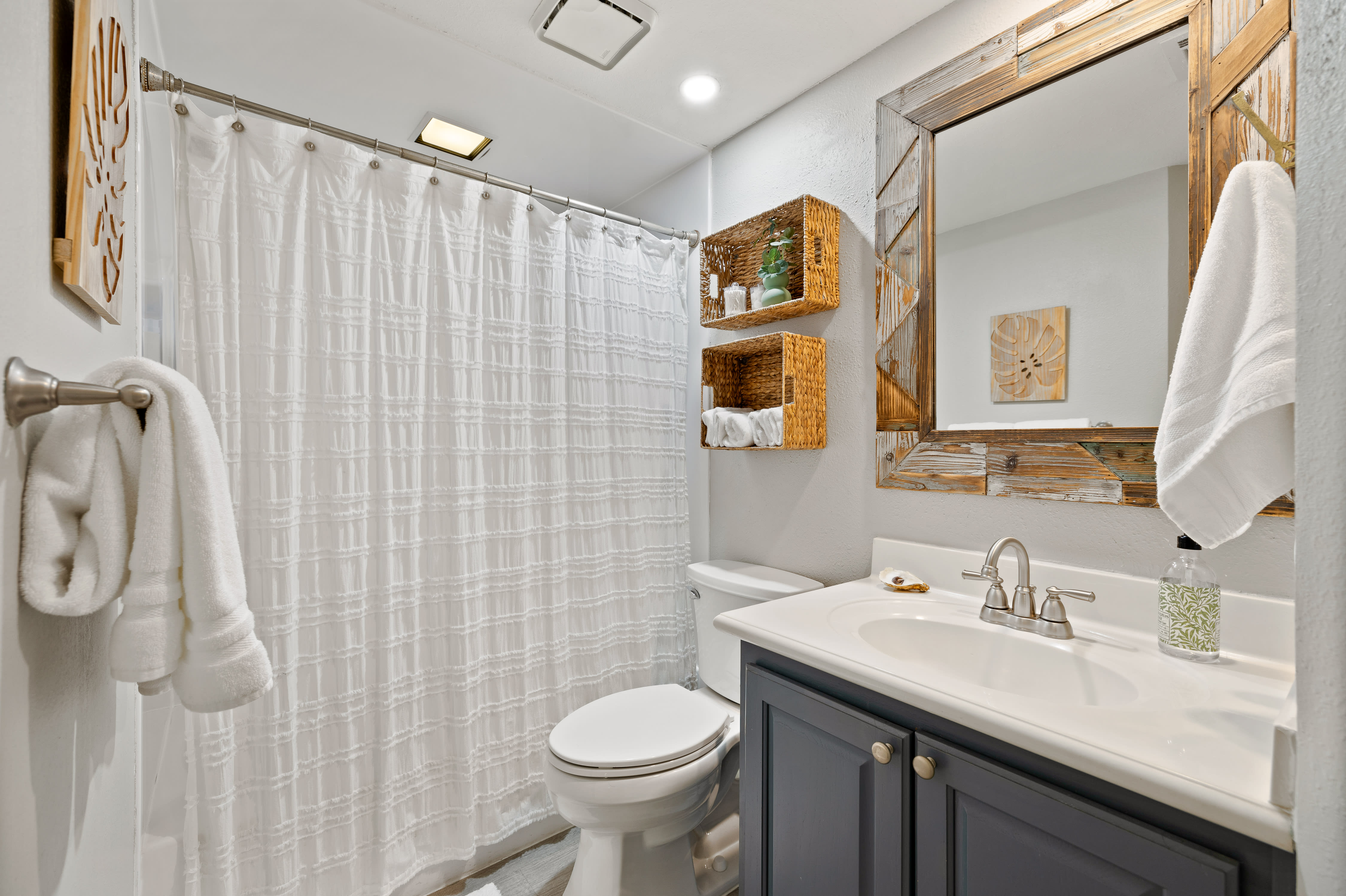Second full bath has a tub/shower combo for guest on this side of the condo.