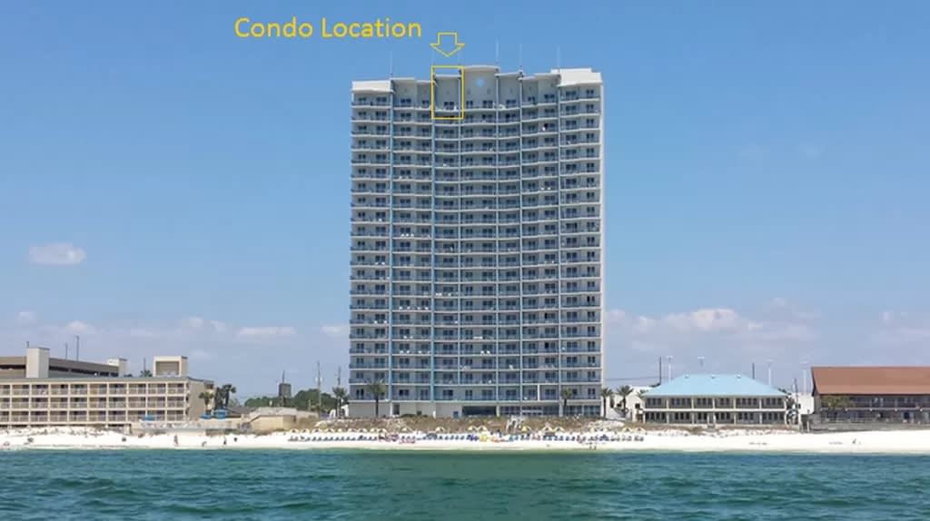 View from beach showing condo is on the top floor for magnificent views!