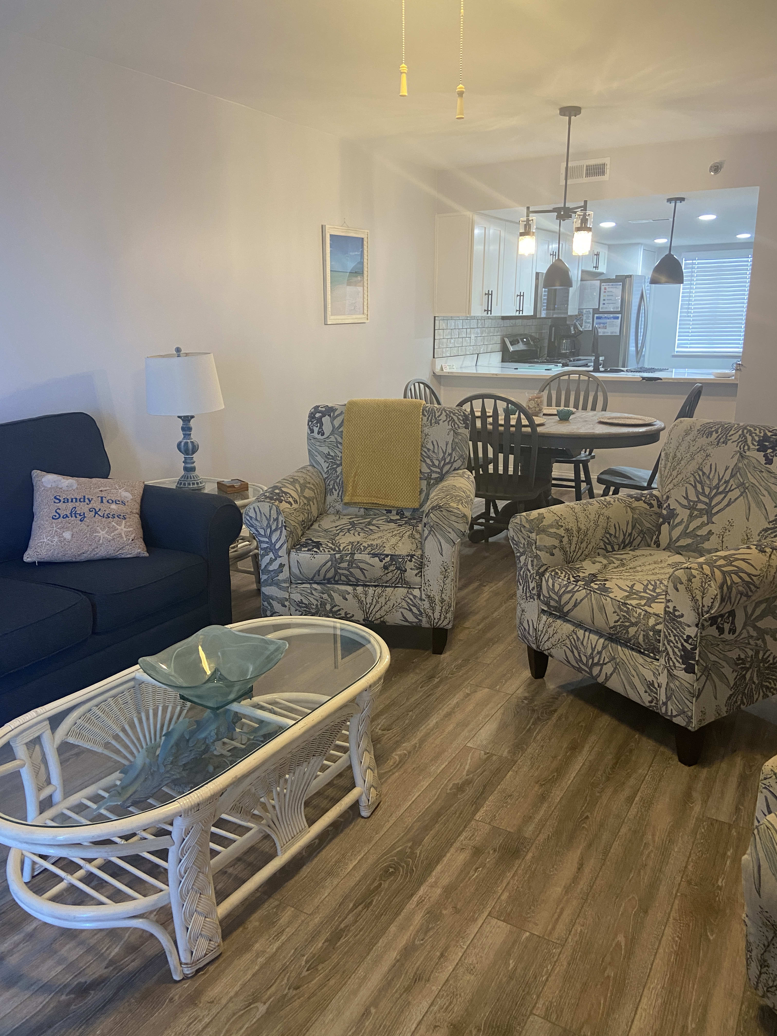 The living area offers a queen sofa bed and ample seating space.