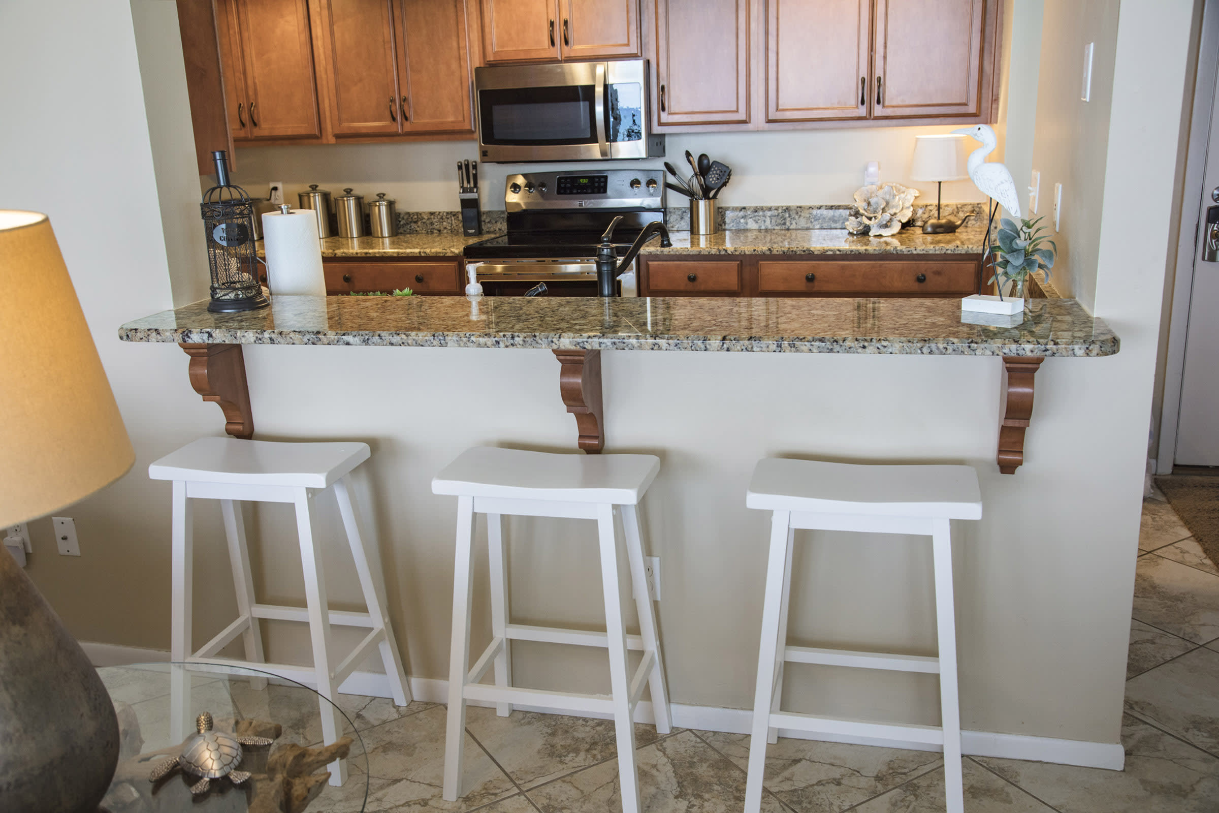 Bar area with 3 bar stools great for the kids!