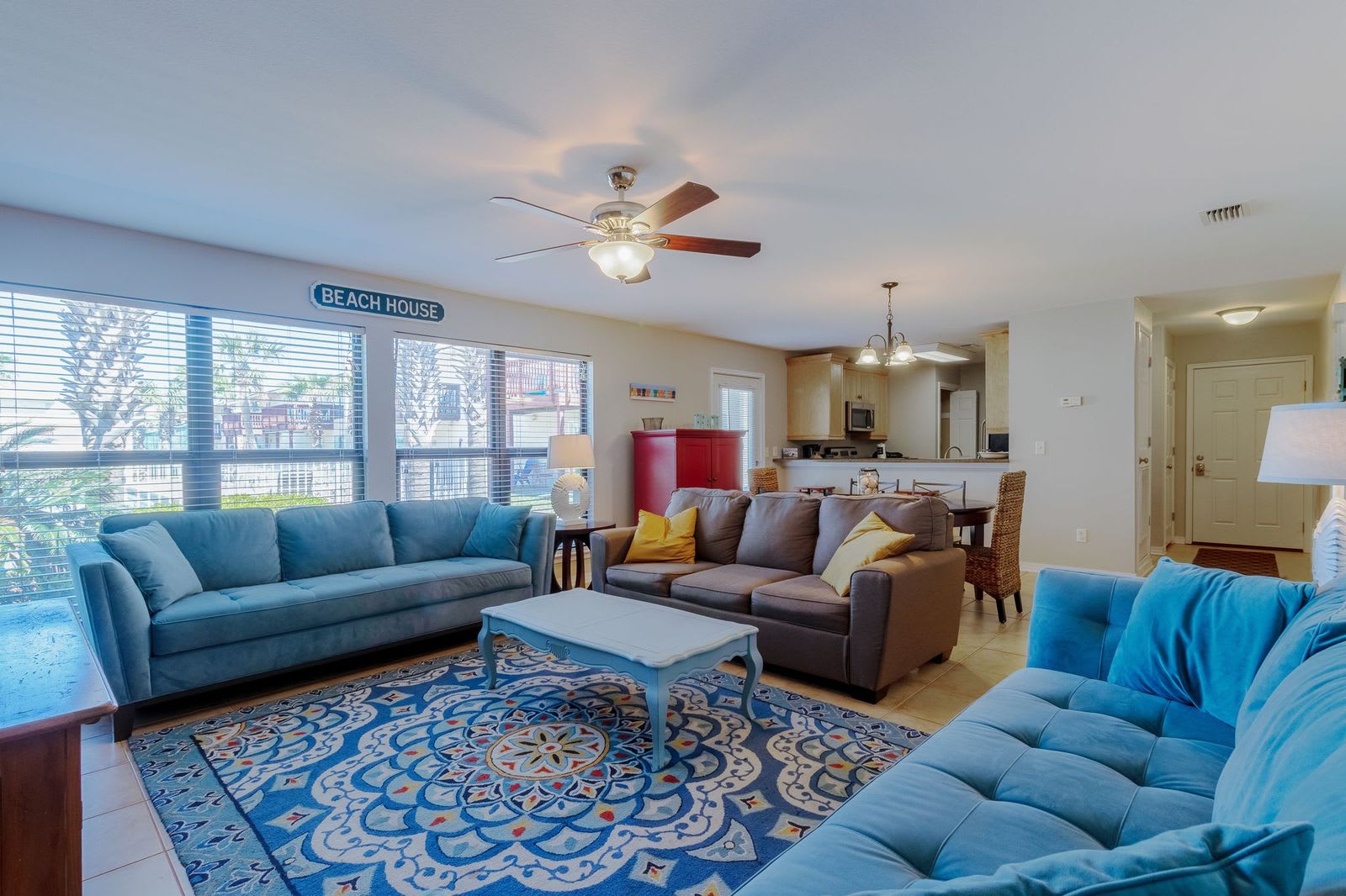 Open floor concept with a view of the back patio and  pool