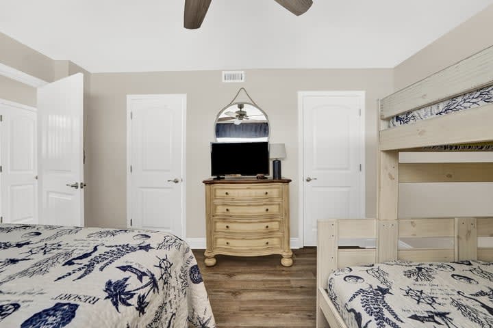 Guest room features a walk-in closet and a bathroom (which has hall access).