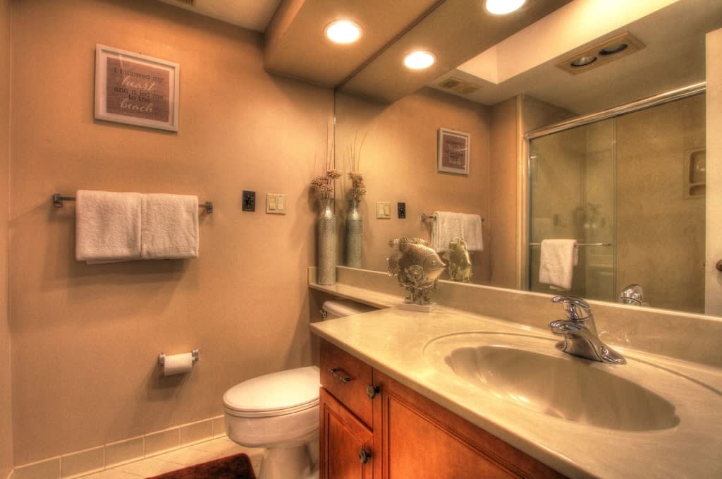 Guest bath, also washer/dryer located