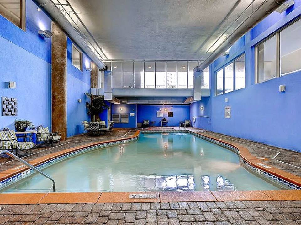 Indoor heated pool and hot tub on first floor.