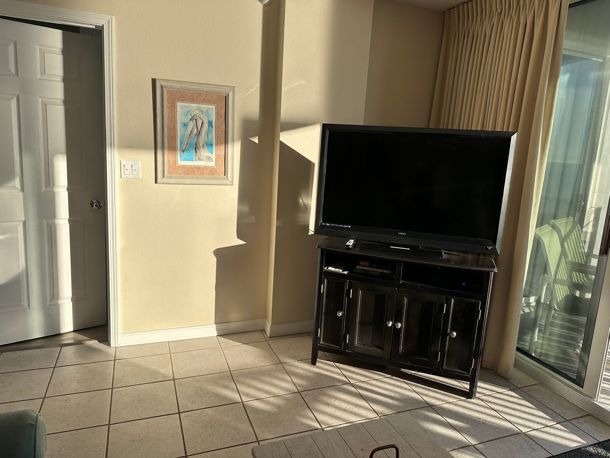 Living room view with large screen TV