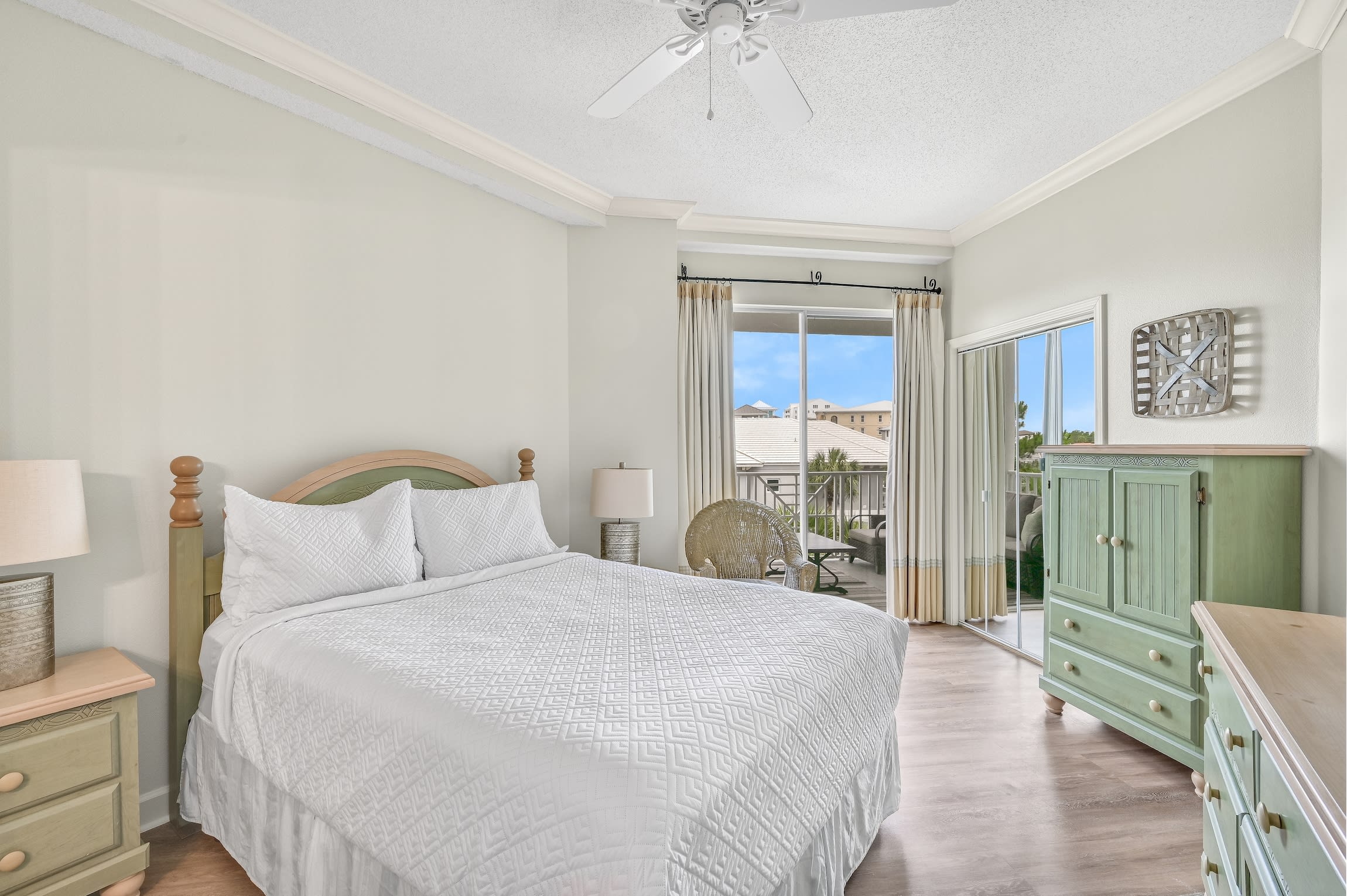 Queen bedroom with access to large patio