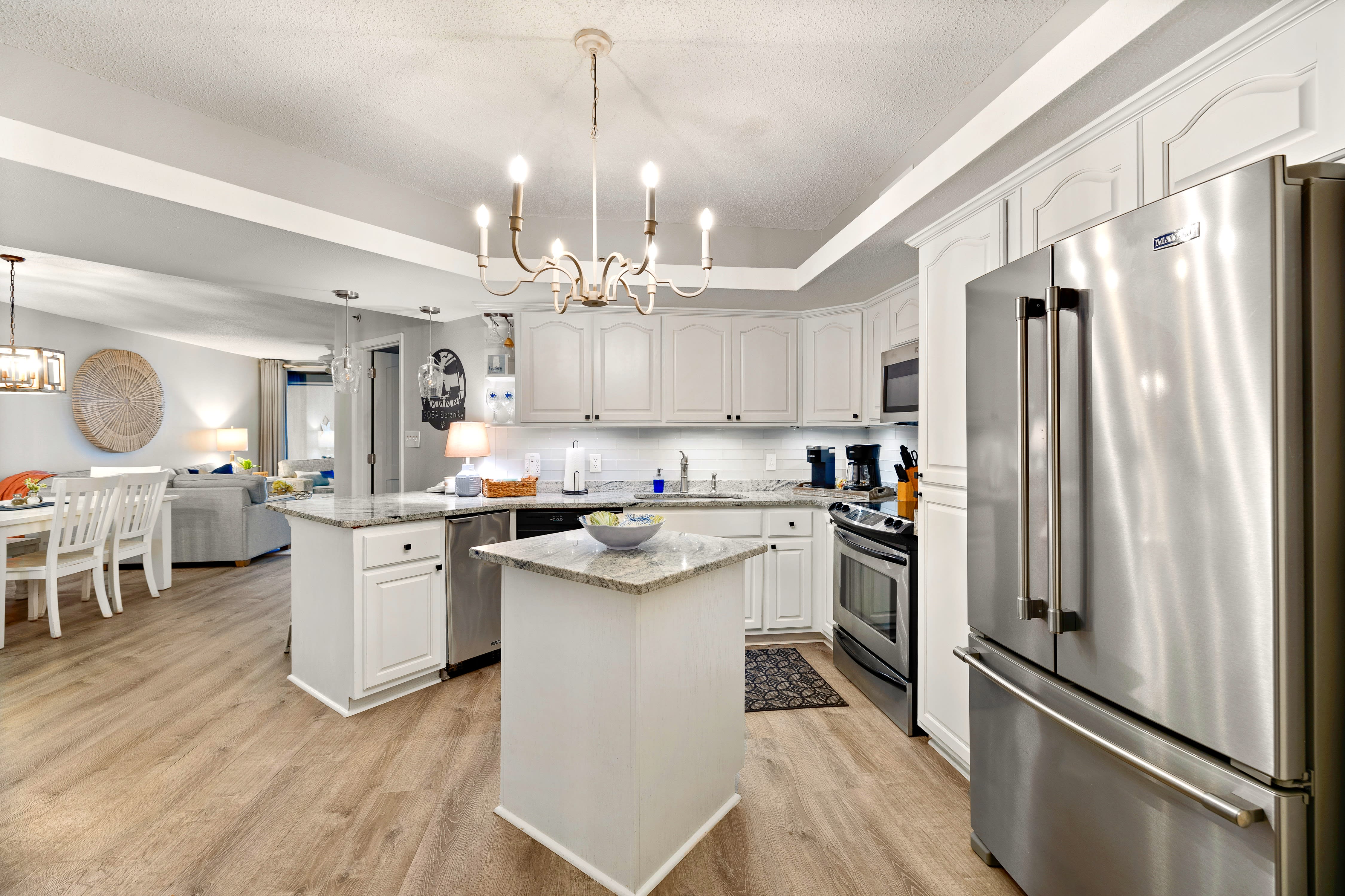 Updated and fully stocked kitchen including a high capacity ice maker