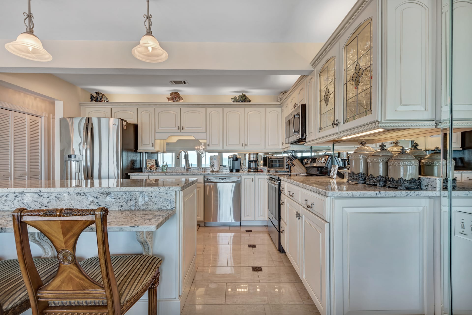 Kitchen with High-End Cabinets with Slow-Close Drawers and some Leaded Glass Doors