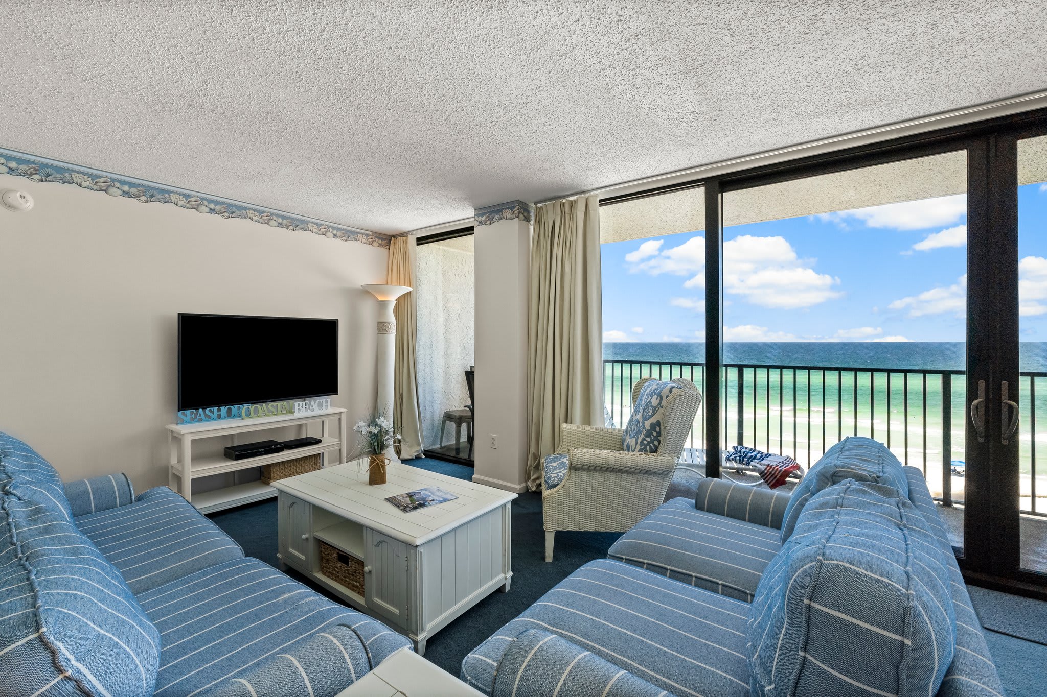 COMFORTABLE LIVING AREA WITH LARGE TV