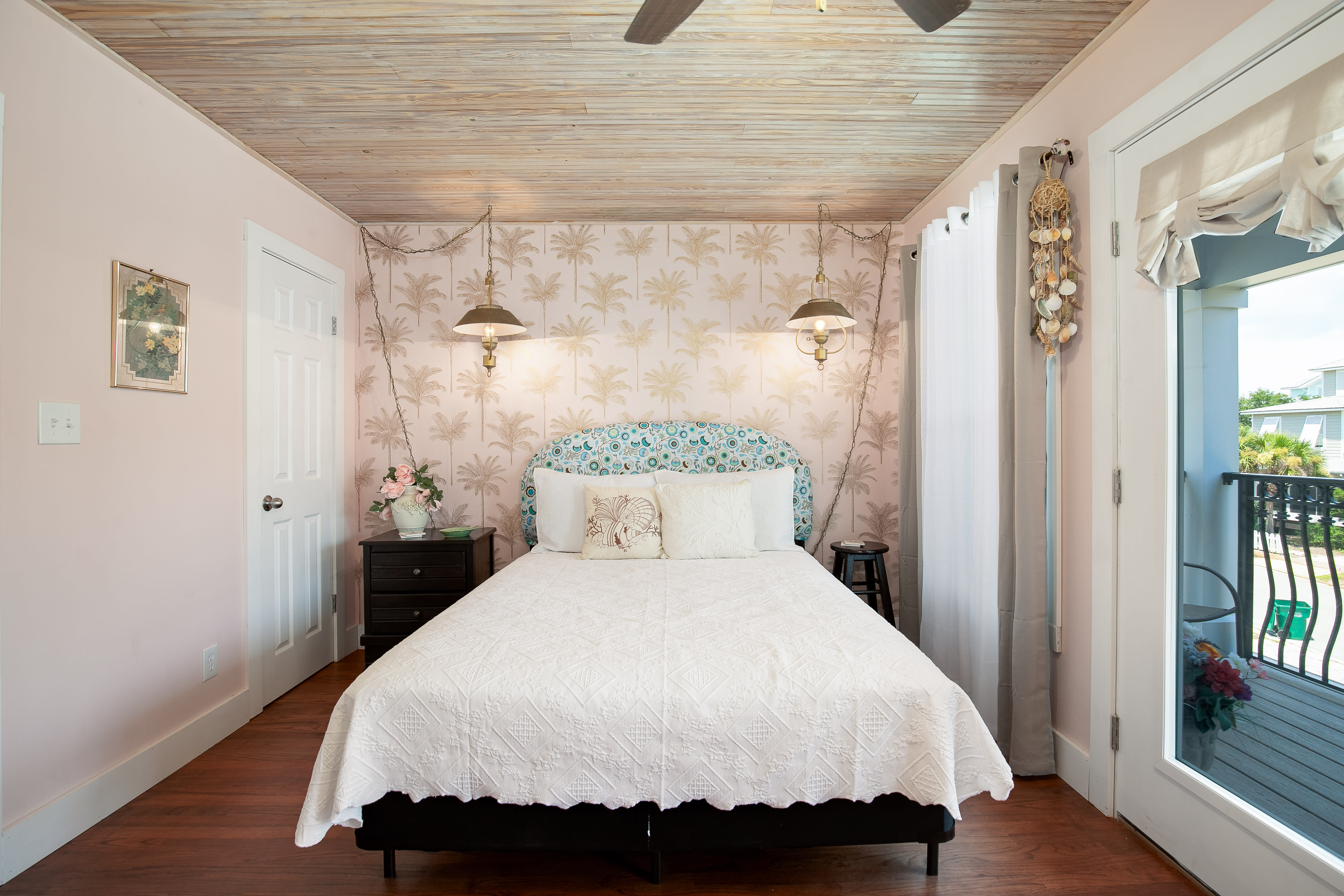 Upstairs master BR with queen bed, deck overlooking pool and ensuite bath.