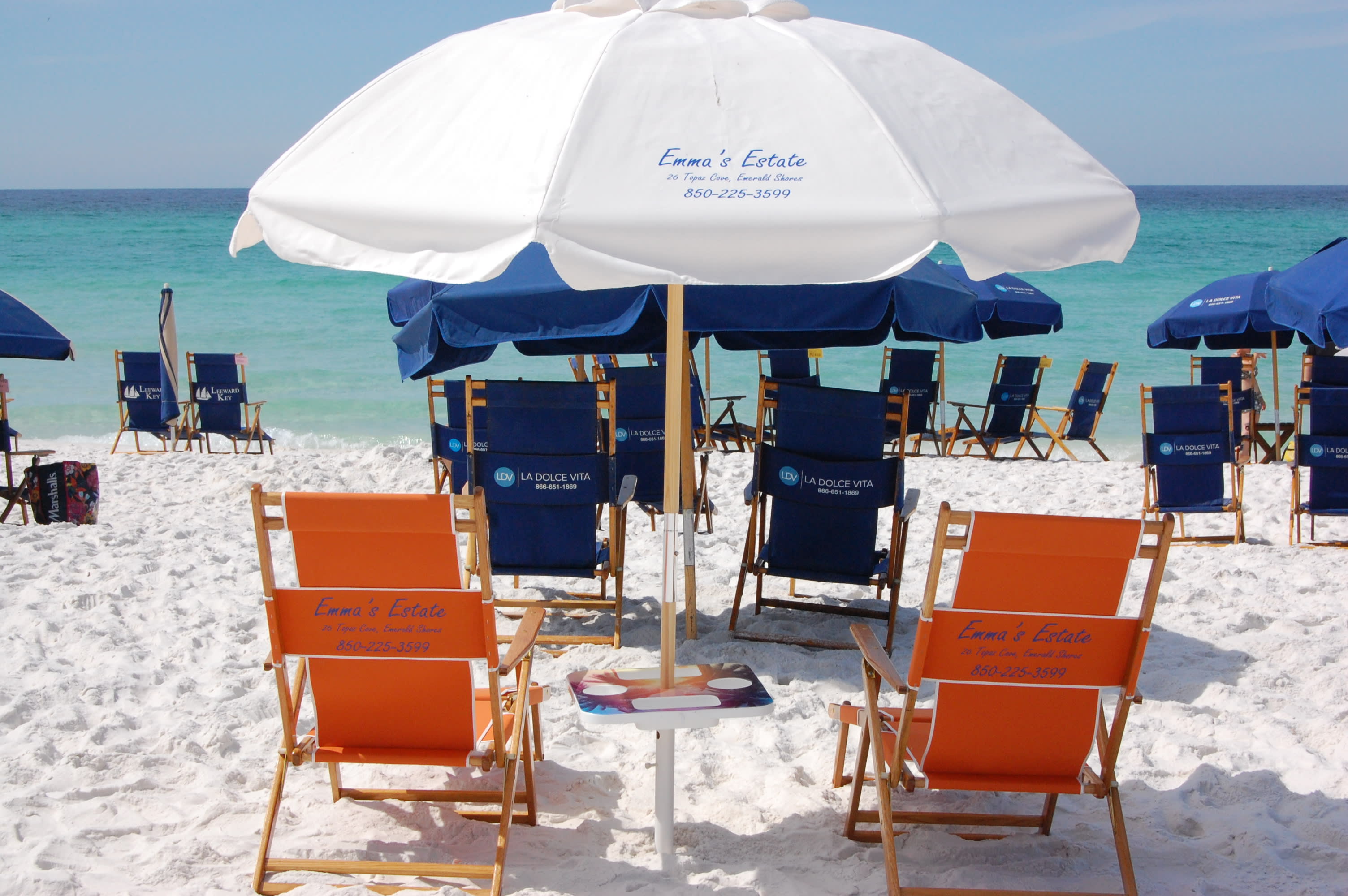 Welcome to the private beach! Four chairs and an umbrella are provided!