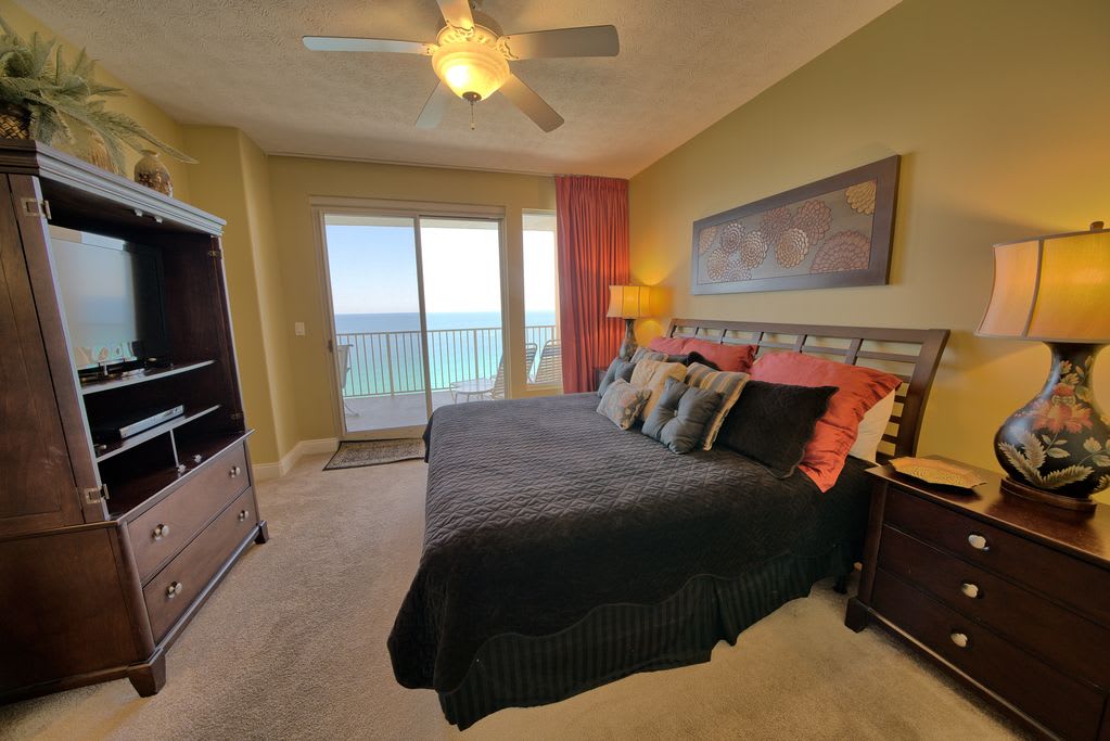 Access to the balcony from the master!  Room darkening curtains!