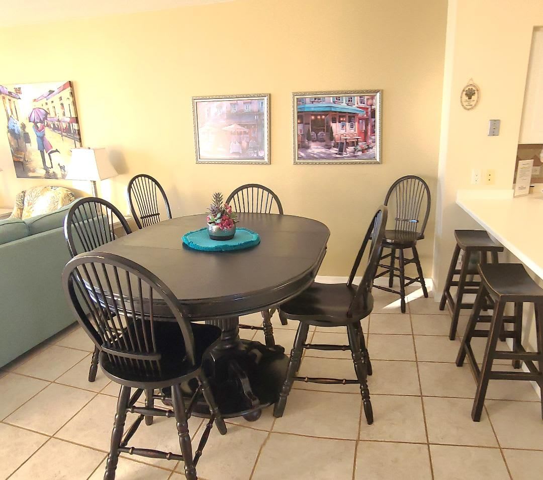 Dining table can seat 6 plus 2 counter stools.
