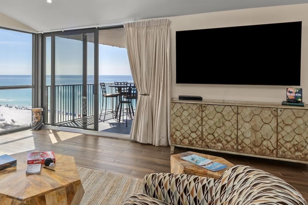 Large Smart TV and comfortable swivel chairs, sofa.