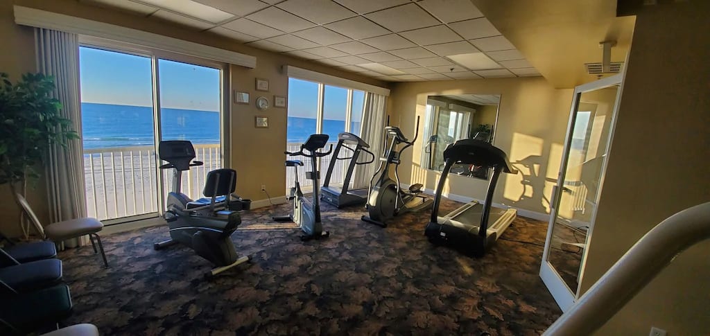 Great exercise room with a variety of machines and beautiful gulf facing view.