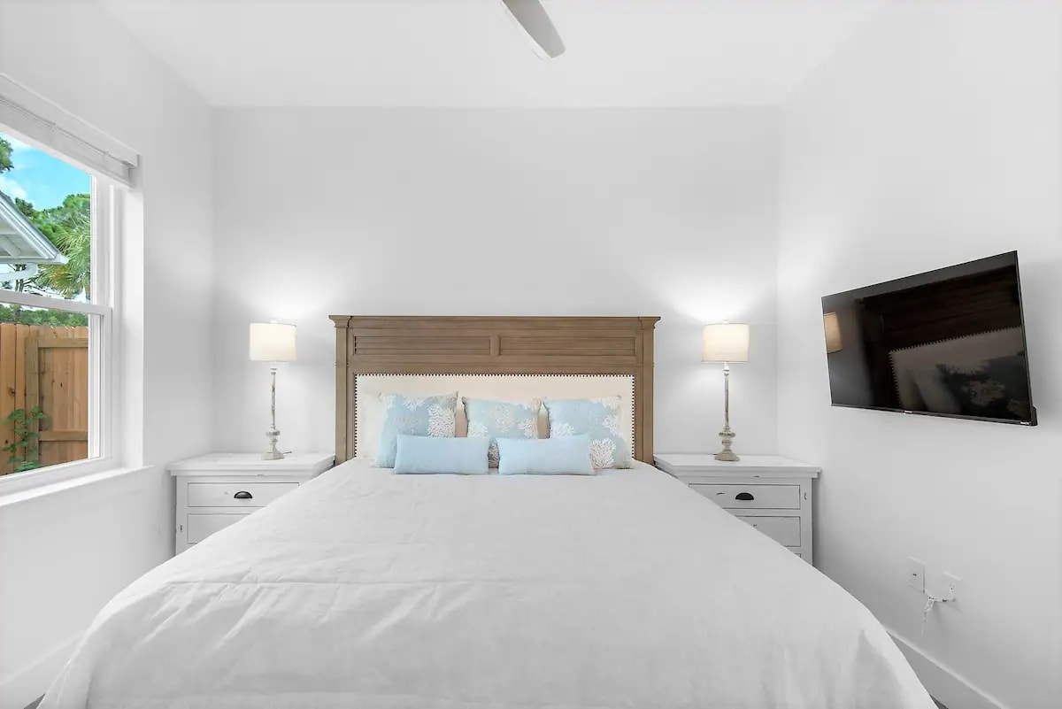 Bliss-23 1st Floor. Bedroom 2. Picture 1. King suite with private full bath with tub/shower combo. This first floor bedroom enables those with mobility challenges to easily participate in the making of the family's new memories.