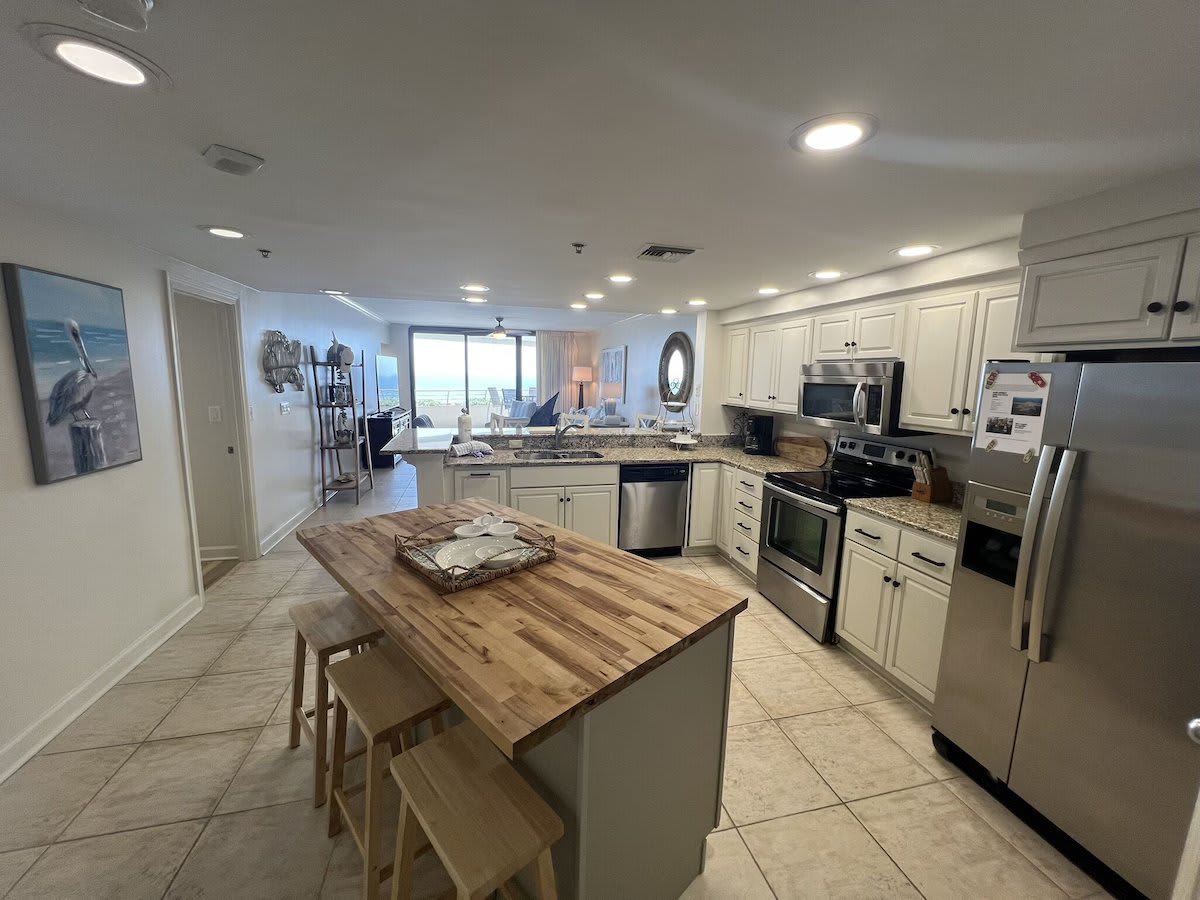 Fully Stocked Kitchen with All Appliances and Butcher Block Island. 