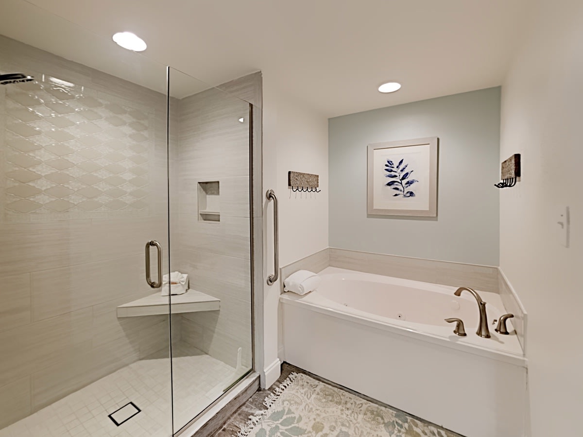 Master bath with luxury shower, separate tub, and water closet.